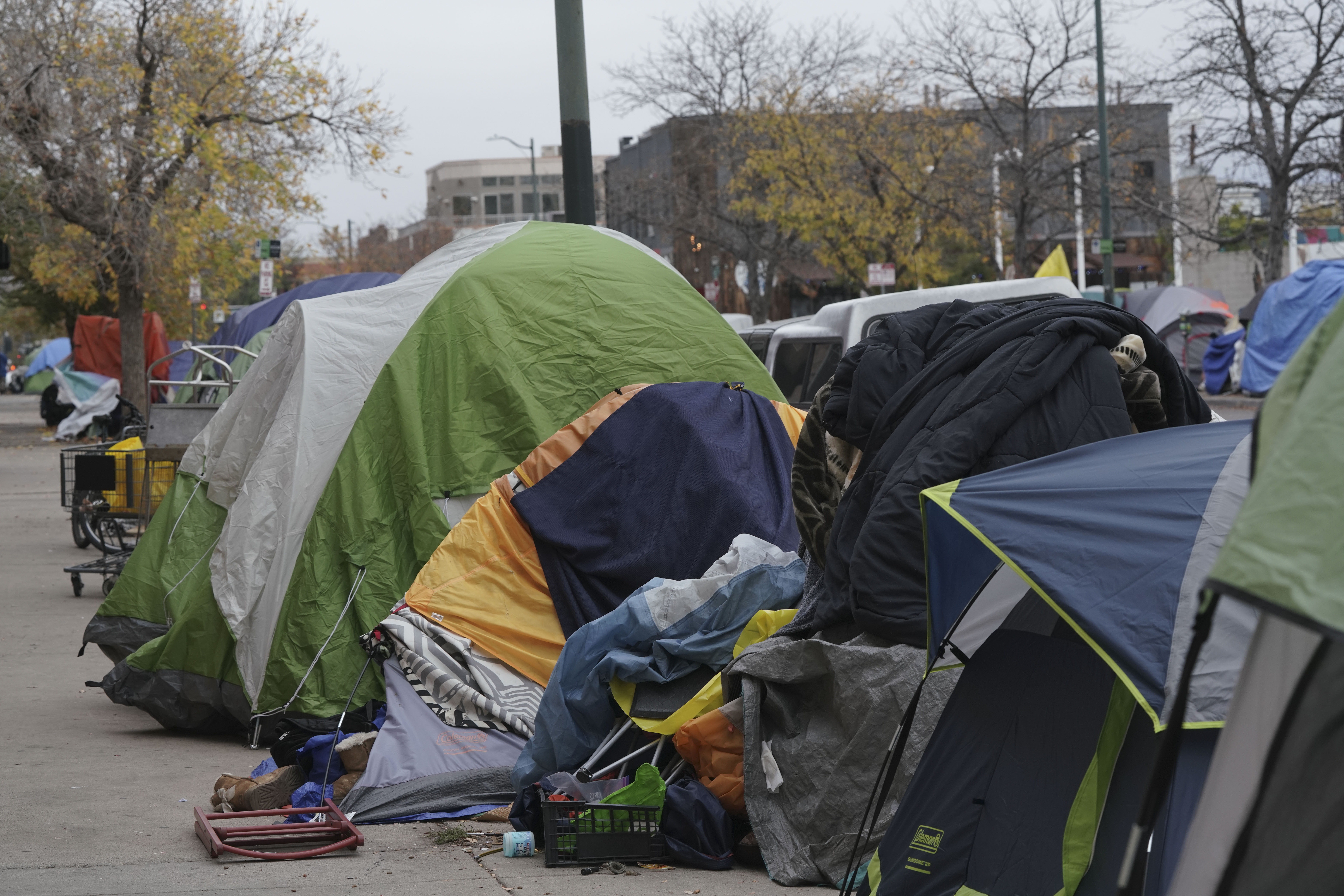 Tents line the sidewalks near 21st and Curtis Street on Thursday, Oct. 26, 2023 in Denver, Colorado. Some 50 homeless people at the encampment are being offered hotel housing as cold weather approaches, according to the mayor’s office. The city is planning to sweep the encampment. (PHOTO: Rebecca Slezak/Special to The Denver Gazette) (Rebecca Slezak)