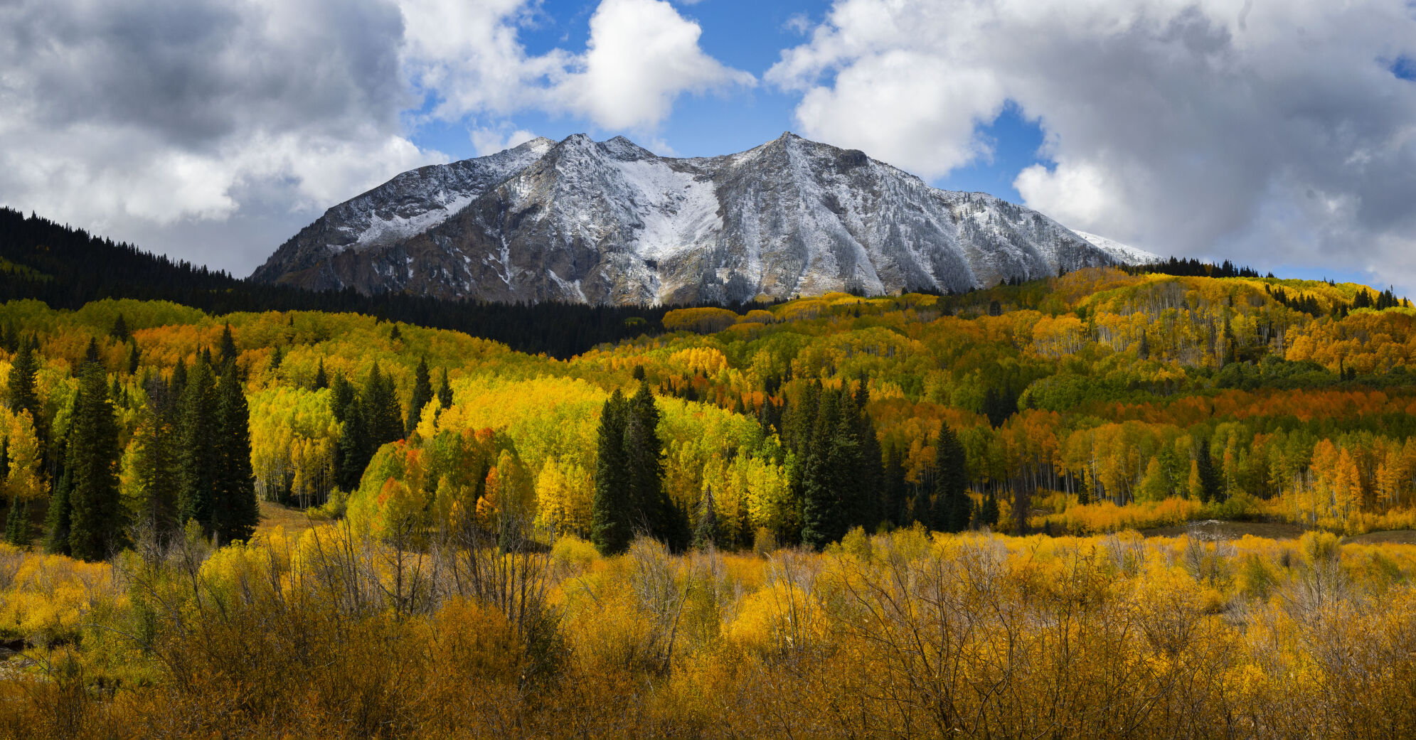 Snow dusts the mountains on the westside of Kebler Pass as the aspens turn Tuesday, Oct. 3, 2023. (The Gazette, Christian Murdock) (Christian Murdock/The Gazette)