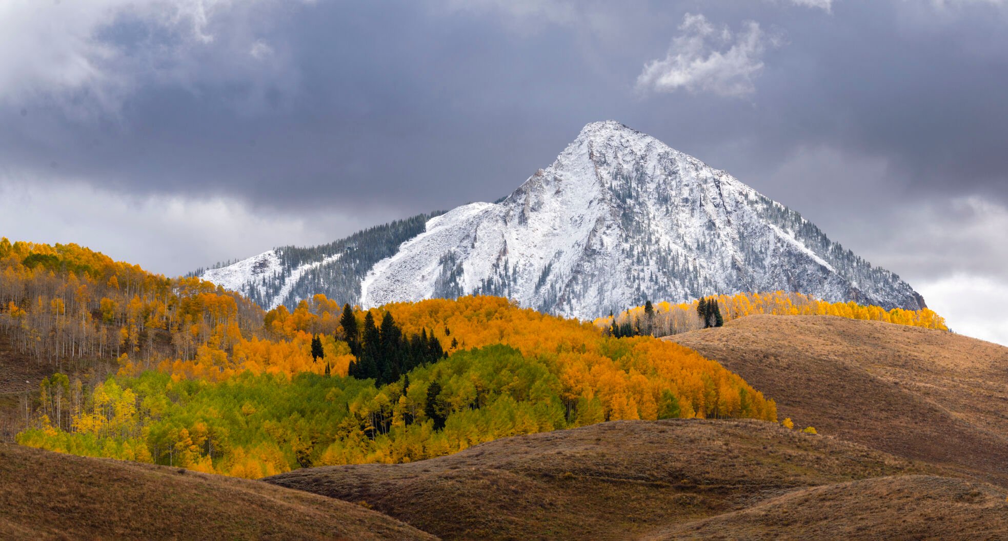 Snow covers Mt. Crested Butte Tuesday, Oct. 3, 2023, as the aspens turn near Slate River. (The Gazette, Christian Murdock) (Christian Murdock/The Gazette)