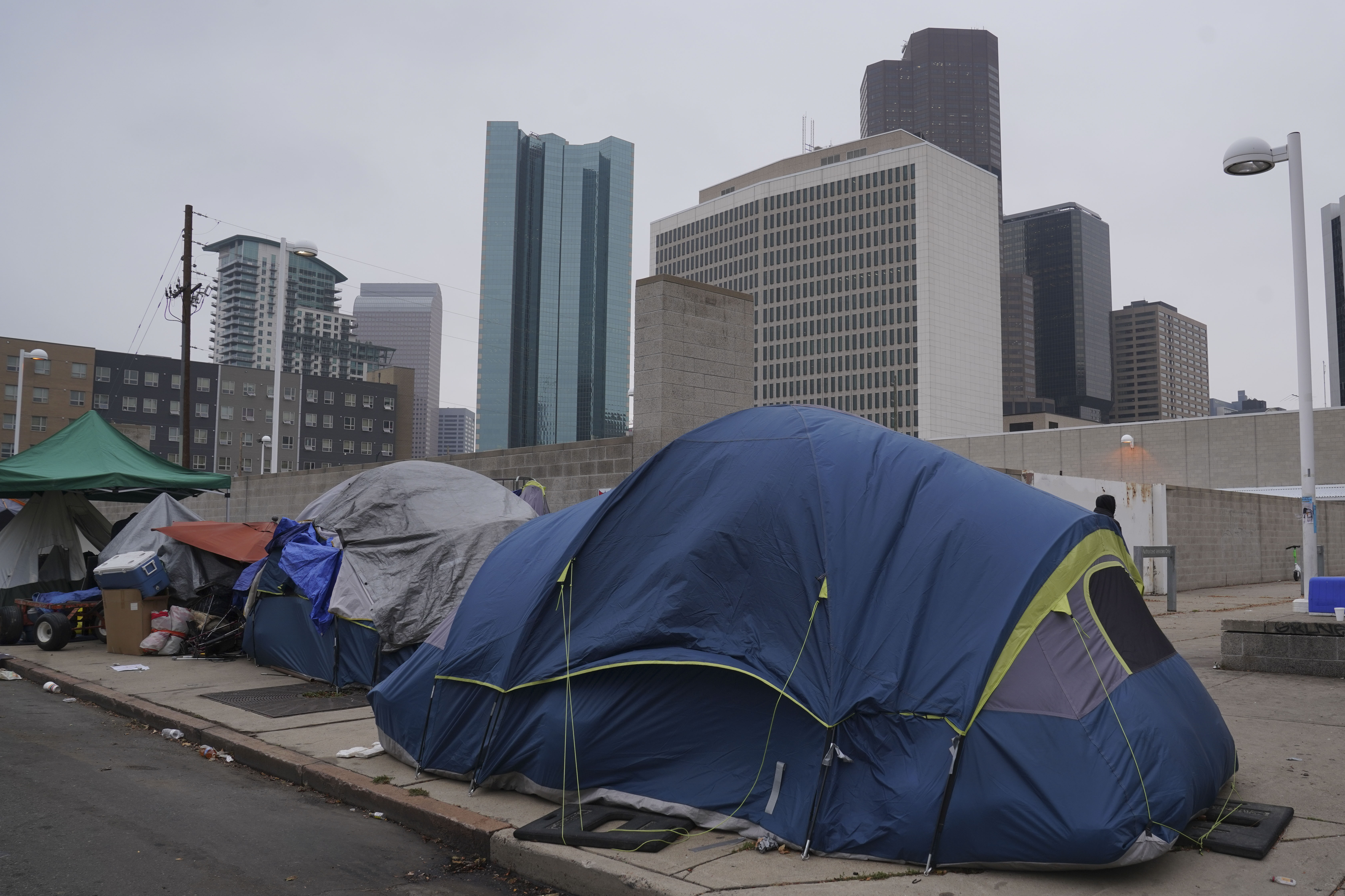 Tents line the sidewalks near 21st and Curtis Street on Thursday, Oct. 26, 2023 in Denver, Colorado. Some 50 homeless people at the encampment are being offered hotel housing as cold weather approaches, according to the mayor’s office. The city is planning to sweep the encampment. (PHOTO: Rebecca Slezak/Special to The Denver Gazette) (Rebecca Slezak)