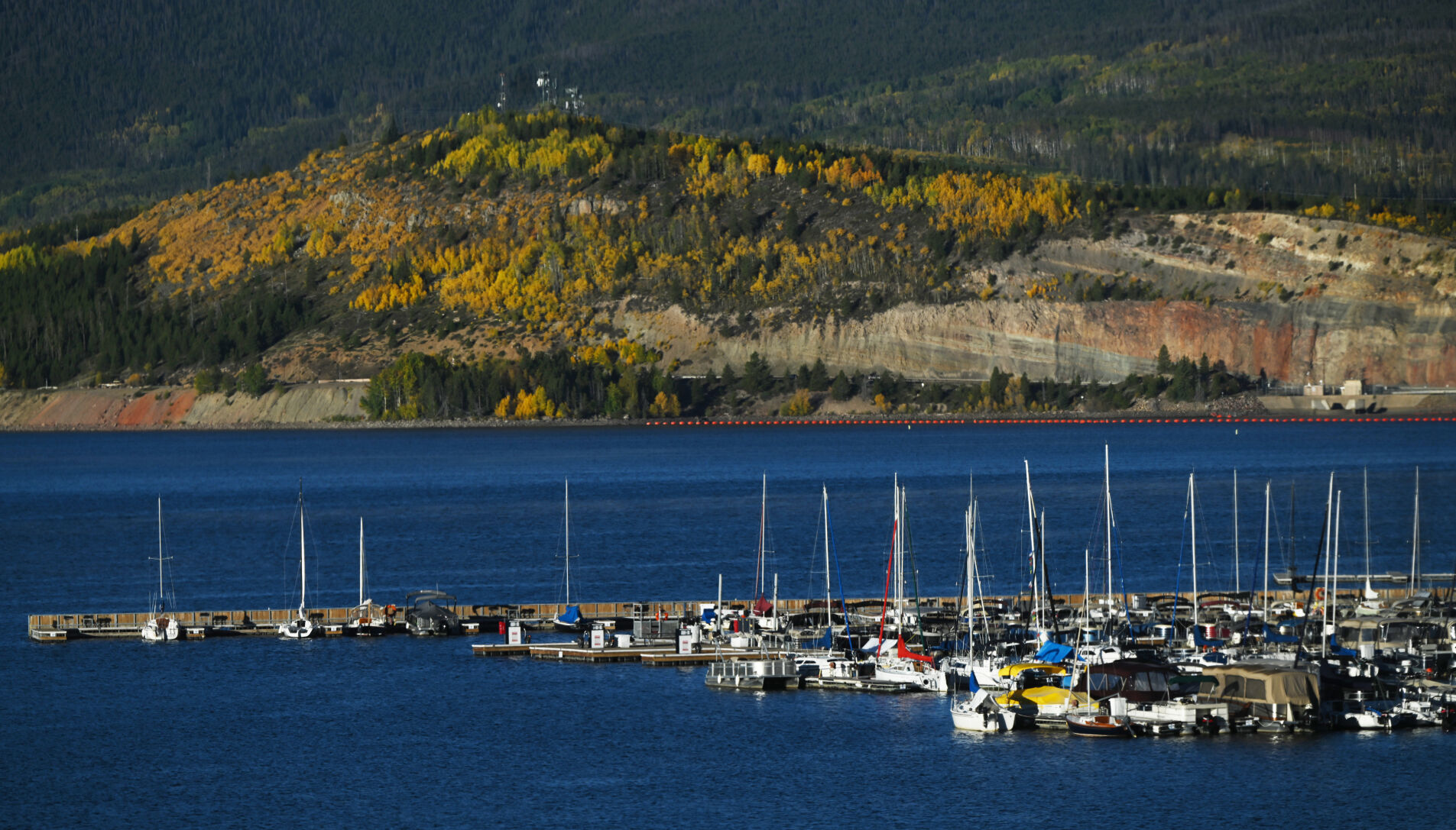 The marina at Lake Dillon with changing aspens on Monday, Sept. 25, 2023. (Photo by Jerilee Bennett, The Gazette)