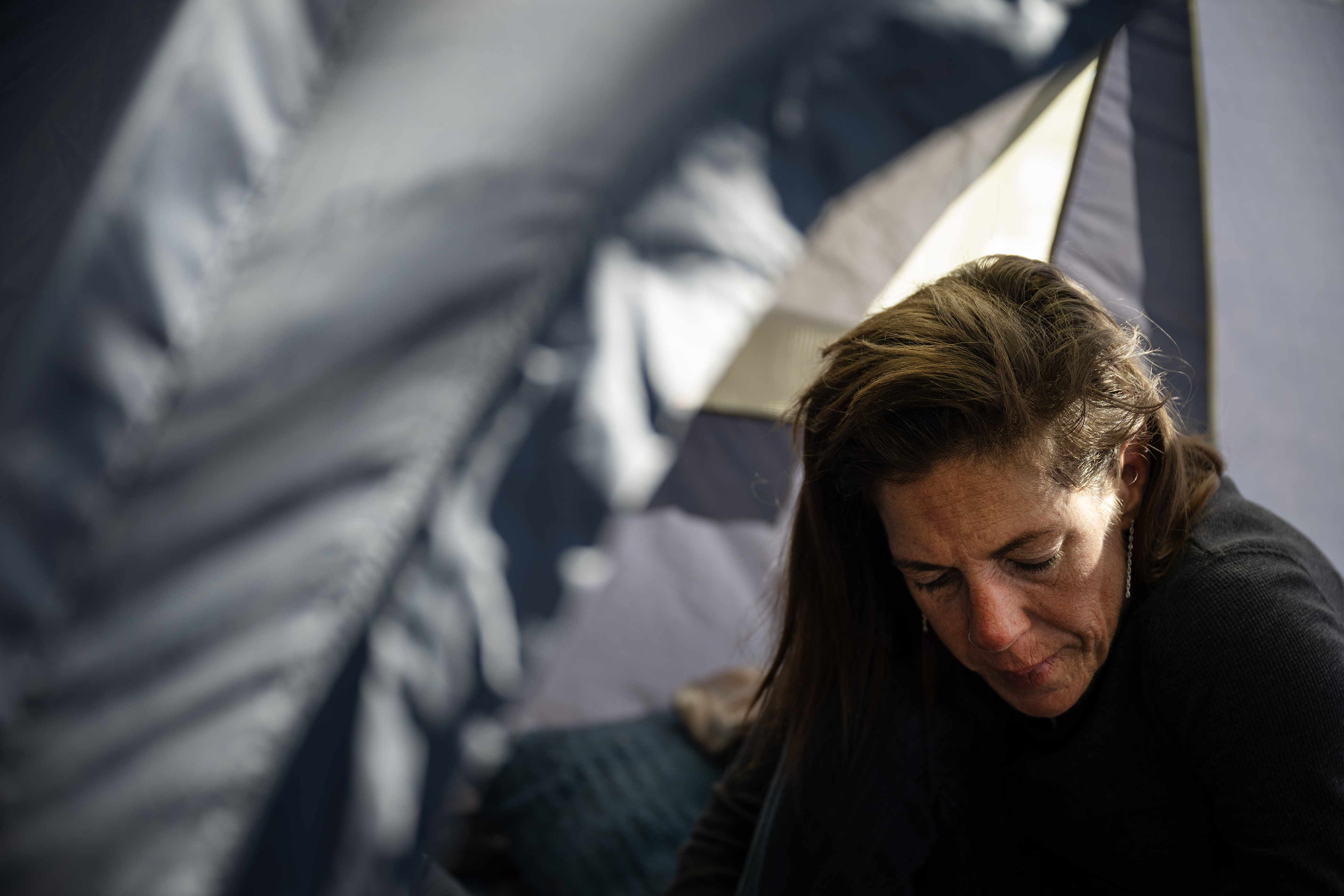 Jodi Froemming, who’s been unhoused for roughly two years, talks about the circumstances that lead her to losing her home and the difficulties in trying to escape homelessness, while in her tent on a traffic island near I-225 and South Parker Road on Thursday, Oct. 5, 2023, in Aurora, Colo. (Timothy Hurst/Denver Gazette) (TimHursttim.hurst@gazette.comhttps://secure.gravatar.com/avatar/aca82bd62b4ee425c598527cd6faa1b1?d=mm&r=g)