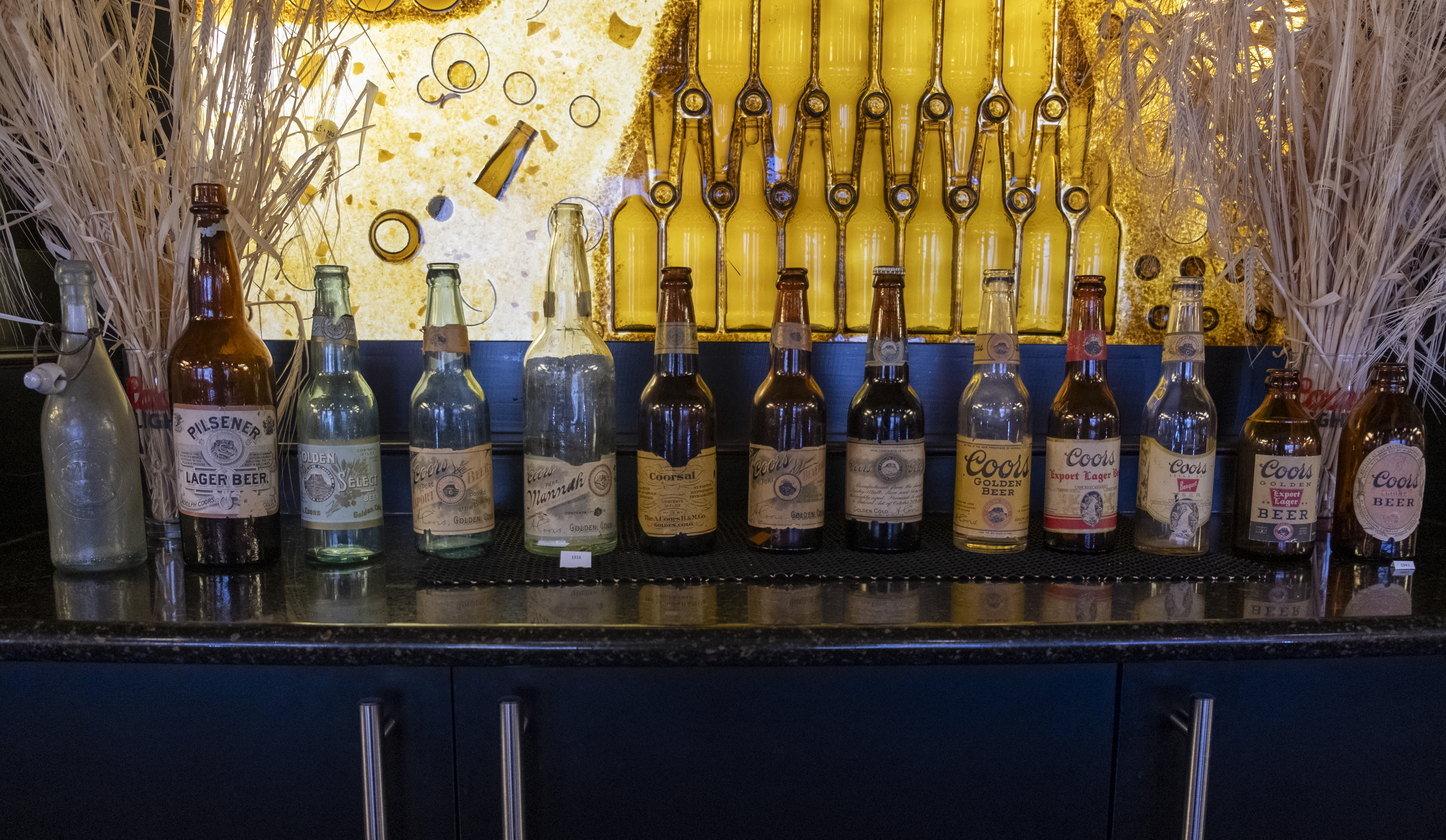 A set of Coors bottles, the sixth bottle from the left is the only known one in existence, ranging from the 1880s to 1990s sits a top a bar at the Coors Brewery in Golden, Colorado. (JonathanIngrahamDigital Strategistjonathan.ingraham@denvergazette.comhttps://denvergazette.com/content/tncms/avatars/c/dd/7f0/cdd7f086-b693-11ec-b373-bba598953eb6.fc0f5608a6f1144f64f080f771bd904d.png)