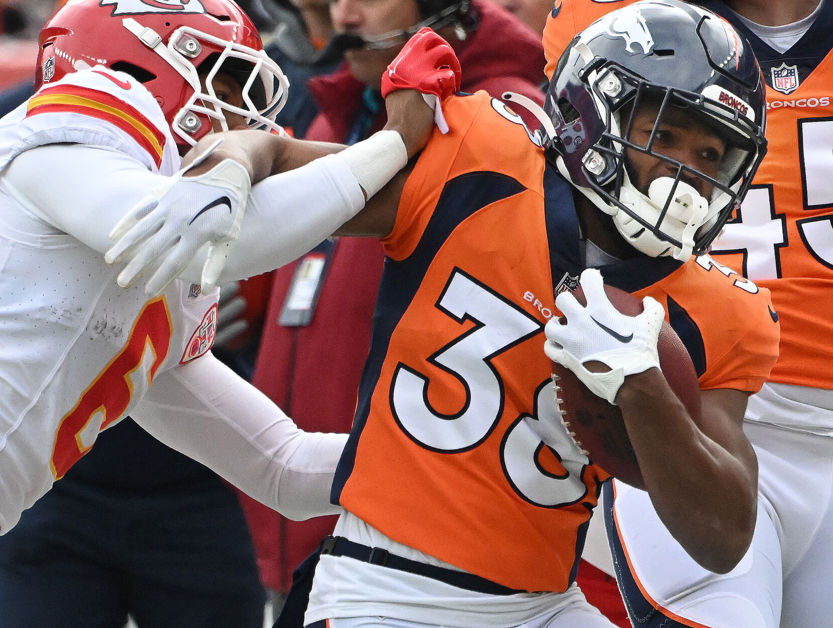 Denver Broncos running back Jaleel McLaughlin (38) carries the ball during a game at Empower Field at Mile High on Sunday, Oct. 29, 2023. The Broncos won the game 24-9. (Photo by Jerilee Bennett, The Gazette)