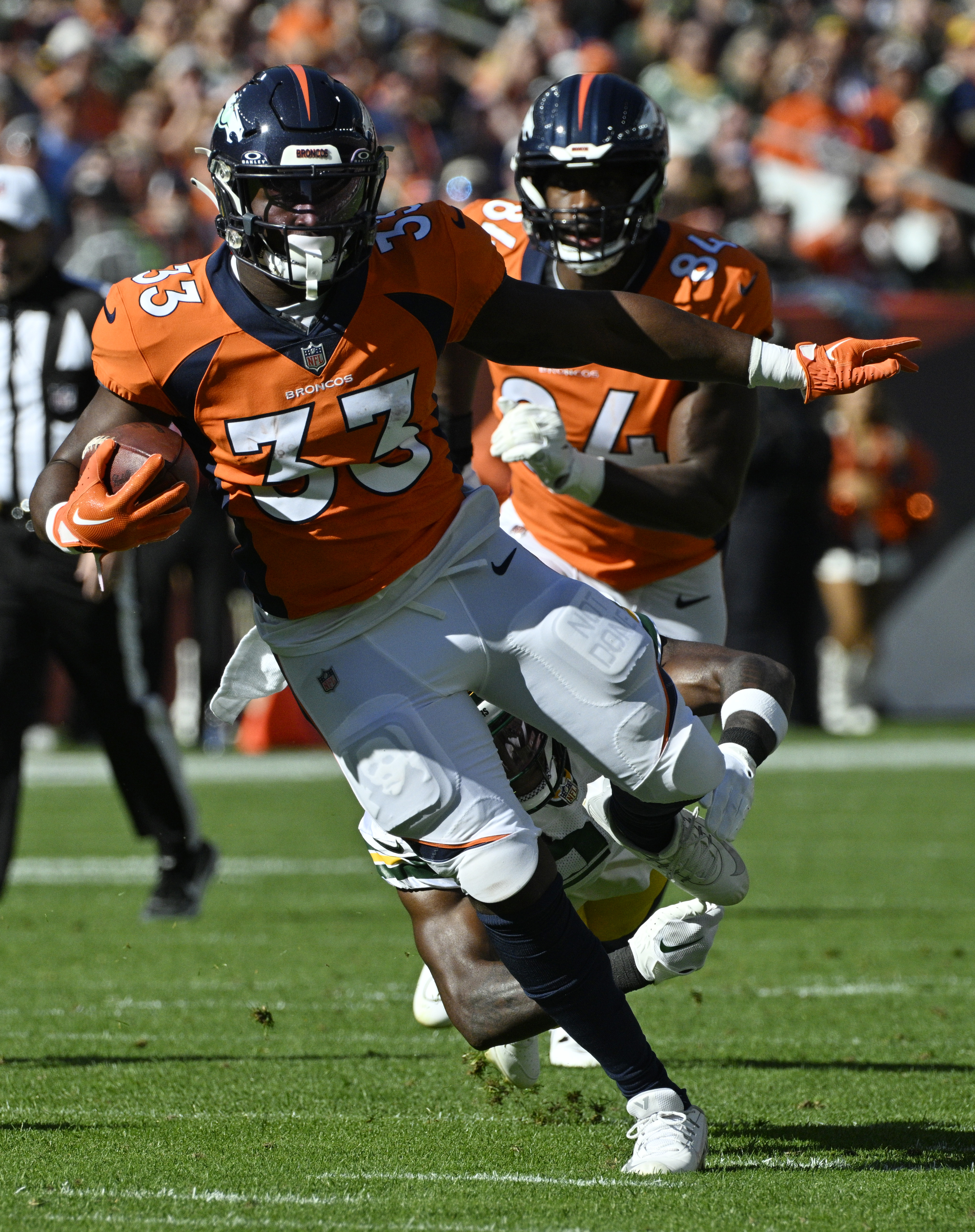 Denver Broncos running back Javonte Williams (33) carries the ball during a game at Empower Field at Mile High on Sunday, Oct. 22, 2023. (Photo by Jerilee Bennett, The Gazette)