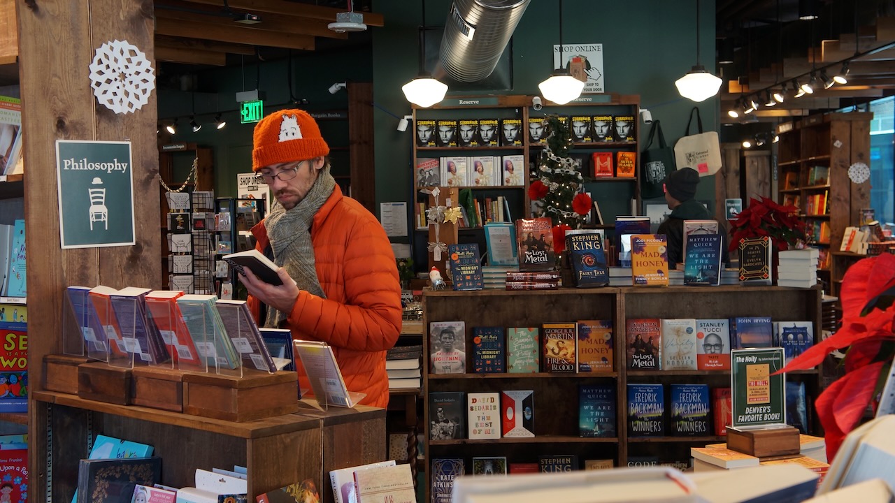 FILE PHOTO: Chris Aagaard considers a boook for sale at the Tattered Cover at McGregor square. Aagaard flew in from Portland, Oregon, and said there is nothing quite like the Tattered Cover. The independent bookstore chain filed for bankruptcy Monday. (AlexanderEdwardsBusiness Reporteralex.edwards@gazette.comhttps://secure.gravatar.com/avatar/dbaa50cc8a9183e280c297e3afa72ace?d=mm&r=g)