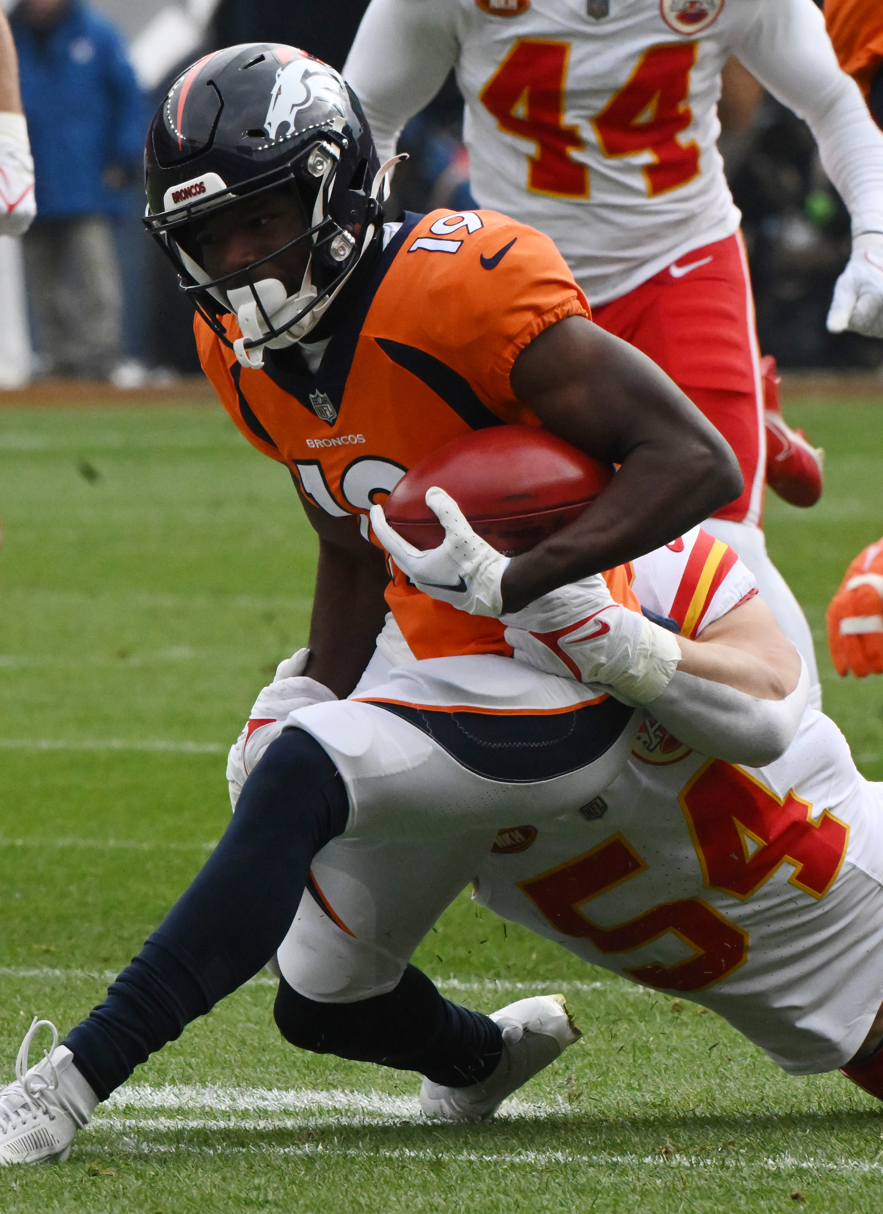 Denver Broncos wide receiver Marvin Mims Jr. (19) carries the ball during a punt during a game at Empower Field at Mile High on Sunday, Oct. 29, 2023. The Broncos won the game 24-9. (Photo by Jerilee Bennett, The Gazette)