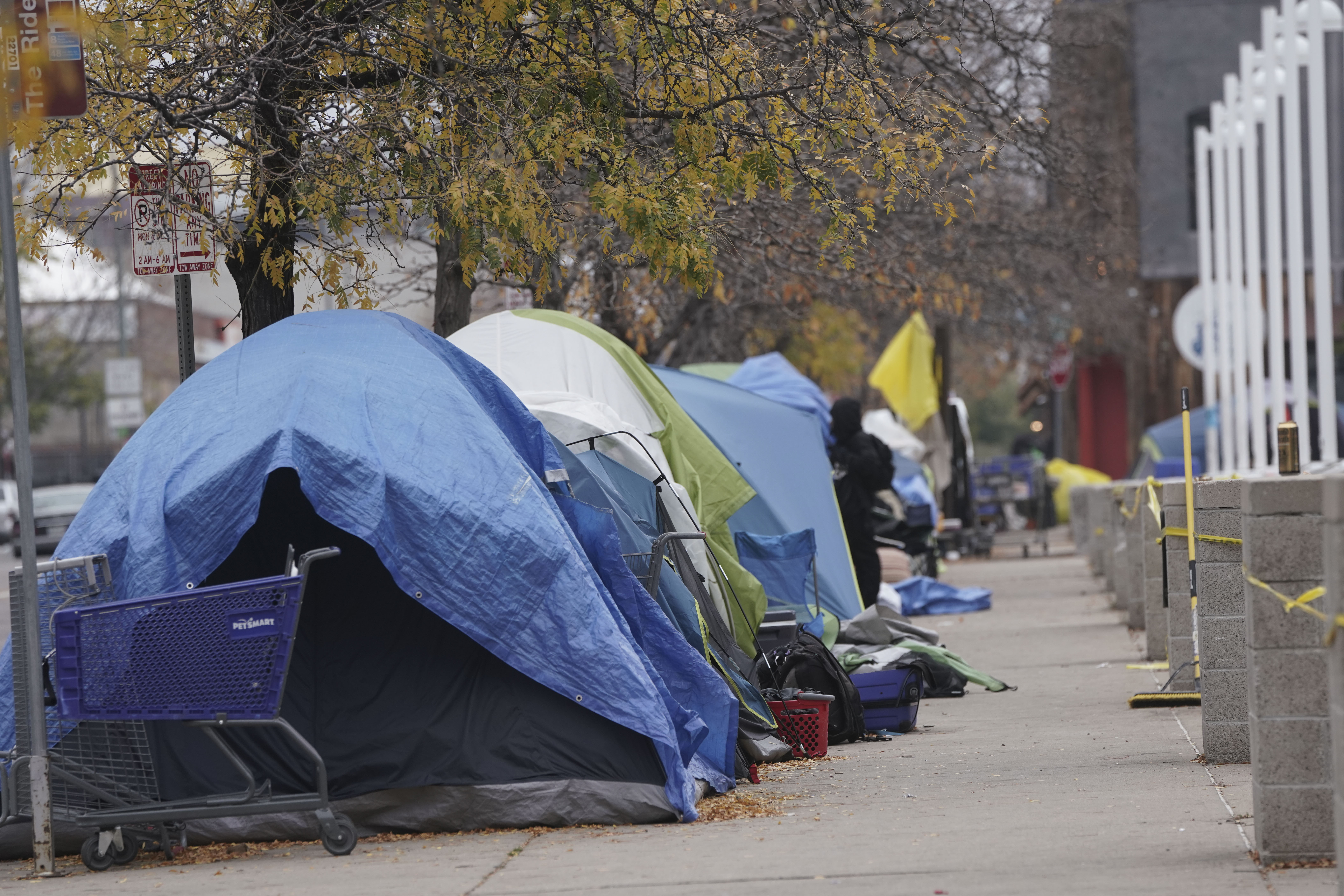 Tents line the sidewalks near 21st and Curtis Street on Thursday, Oct. 26, 2023 in Denver, Colorado. Some 50 homeless people at the encampment are being offered hotel housing as cold weather approaches, according to the mayor’s office. The city plans to sweep the encampment. (PHOTO: Rebecca Slezak/Special to The Denver Gazette) (Rebecca Slezak)
