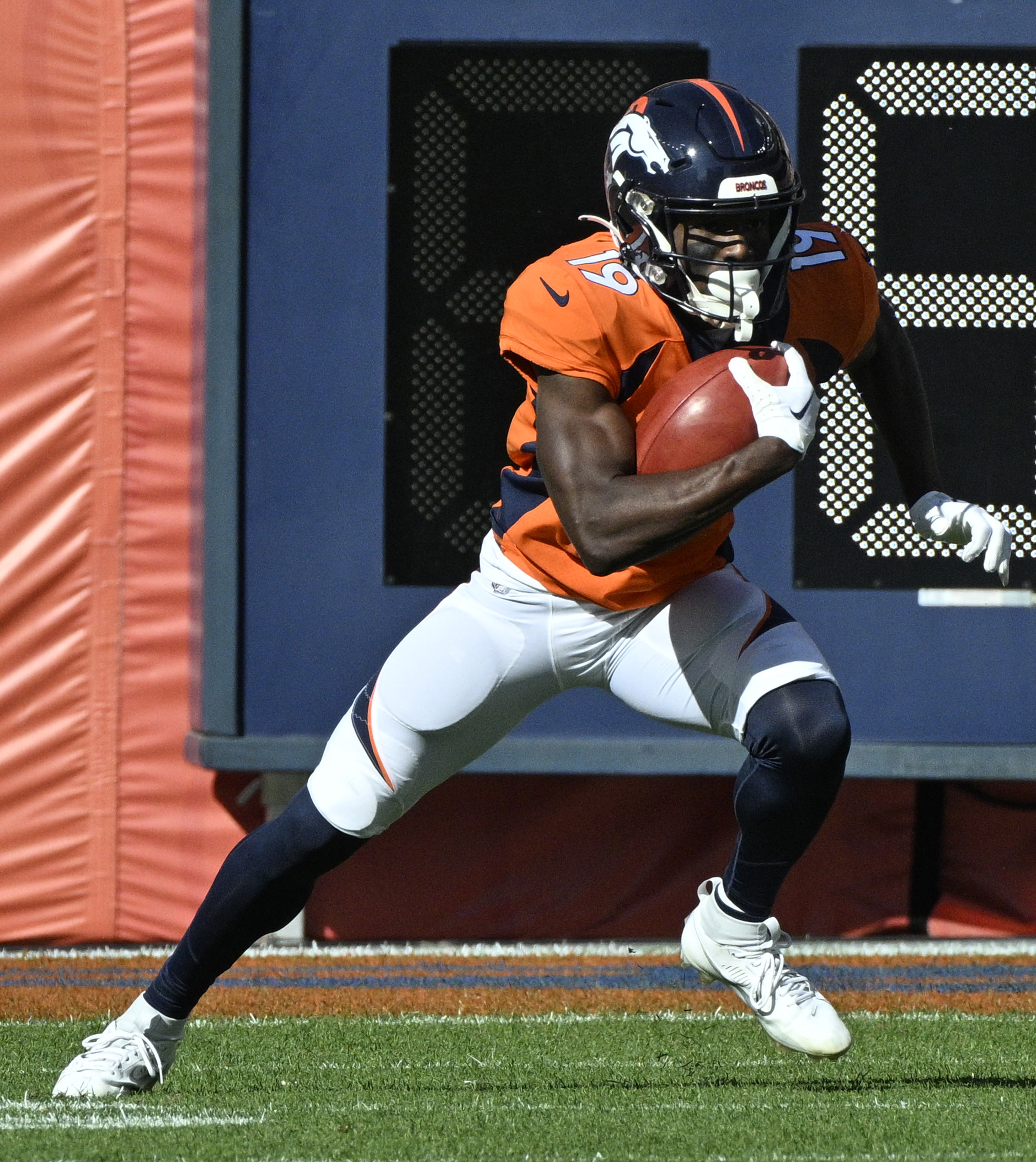 Denver Broncos wide receiver Marvin Mims Jr. (19) returns a punt during a game at Empower Field at Mile High on Sunday, Oct. 22, 2023. (Photo by Jerilee Bennett, The Gazette)