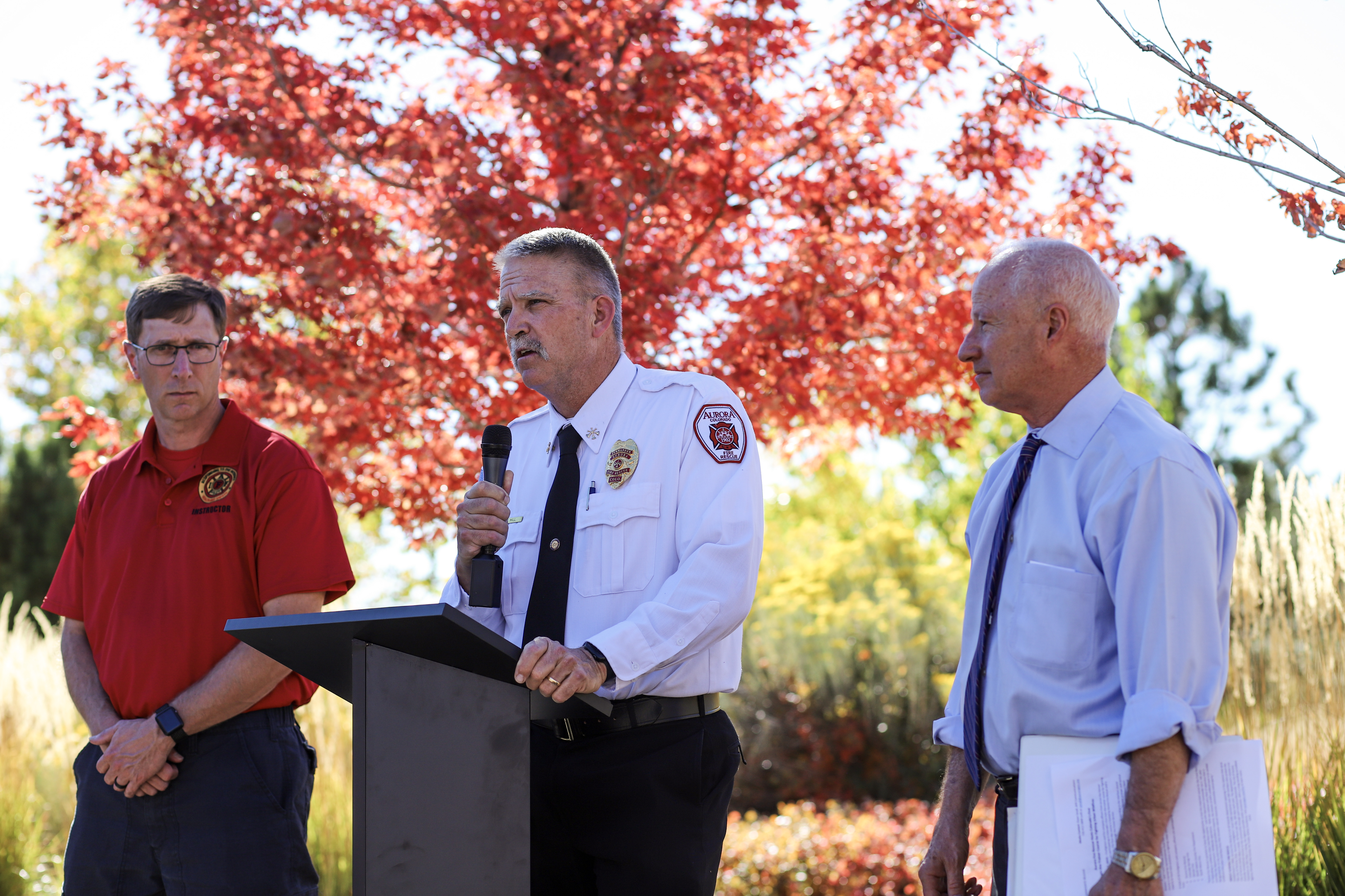Aurora Fire Rescue operations manager Jon Hill speaks about the importance of urban wildland fire training alongside Colorado Springs Fire Battalion Chief Justin White (left) and Aurora mayor Mike Coffman (right). (KylaPearceAurora reporterkyla.pearce@denvergazette.comhttps://denvergazette.com/content/tncms/avatars/2/16/1e5/2161e54a-3f47-11ed-bc0c-ff41892600ae.4fb8f678b9b96eab286c33c5af828fe7.png)