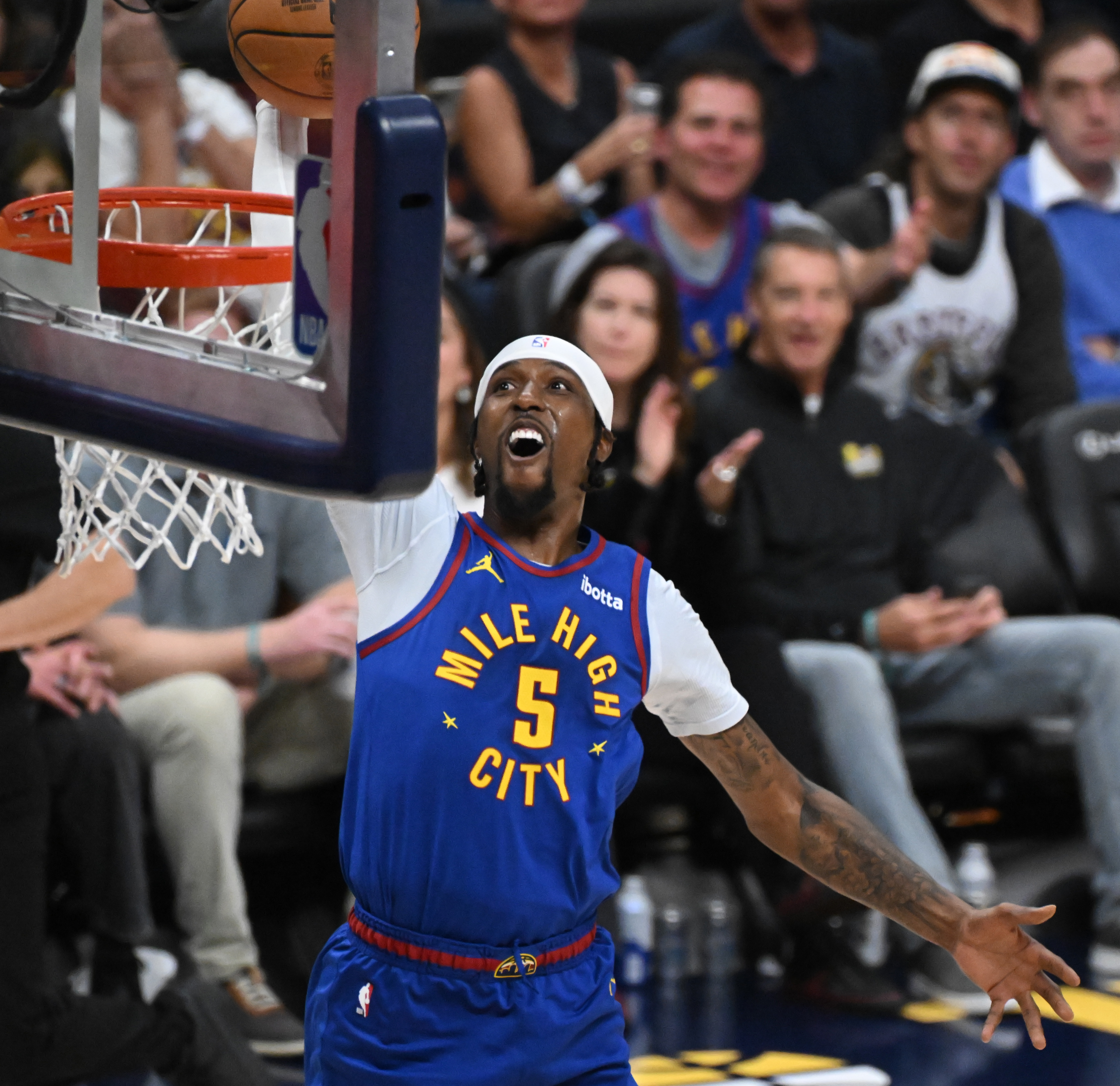 Nuggets Kentavious Caldwell-Pope dunks the ball after stealing it from Lakers Cam Reddish during the second half of a game against the Lakers. The Nuggets defeated the Laker 119-107 at Ball Arena on Tuesday, Oct. 24, 2023. (Photo by Jerilee Bennett, The Gazette)