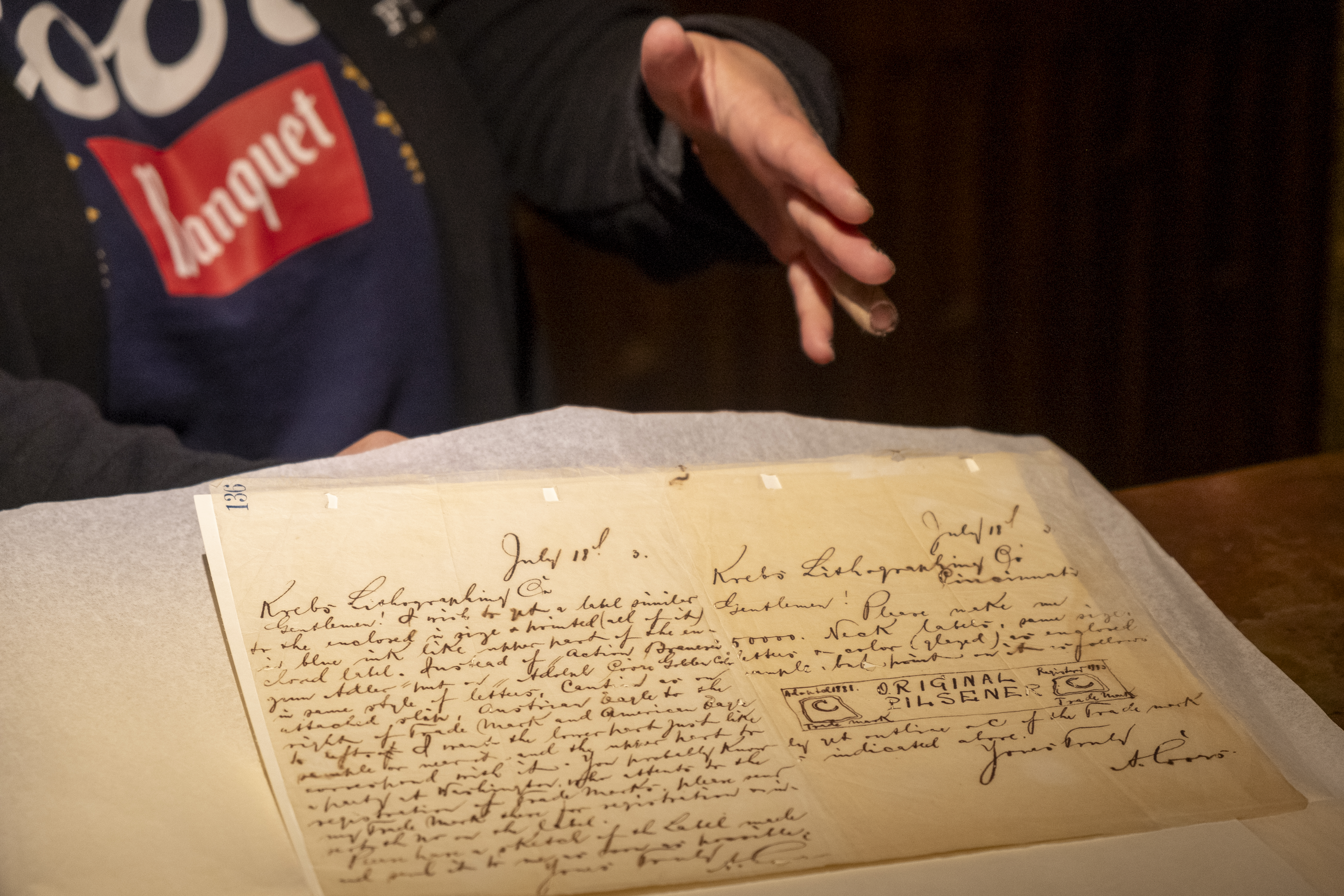 Heidi Harris, archivist at Coors Miller, shows original patent paperwork for a Coors beer during a talk at the Coors Brewery in Golden, Colorado. (JonathanIngrahamDigital Strategistjonathan.ingraham@denvergazette.comhttps://denvergazette.com/content/tncms/avatars/c/dd/7f0/cdd7f086-b693-11ec-b373-bba598953eb6.fc0f5608a6f1144f64f080f771bd904d.png)