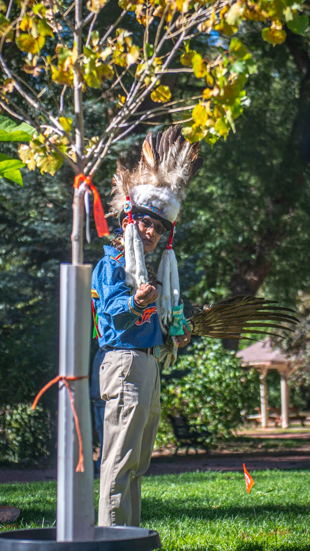 Descendent of the Chippewa, Apache, Yaqui and Ute is spiritual medicine man James Cantu of Colorado Springs; Cantu gives a blessing to the Peace Tree and the hole the tree will be buried in before the formal ceremony begins. (Gabi Broekema, The Gazette) (Gabi Broekema)