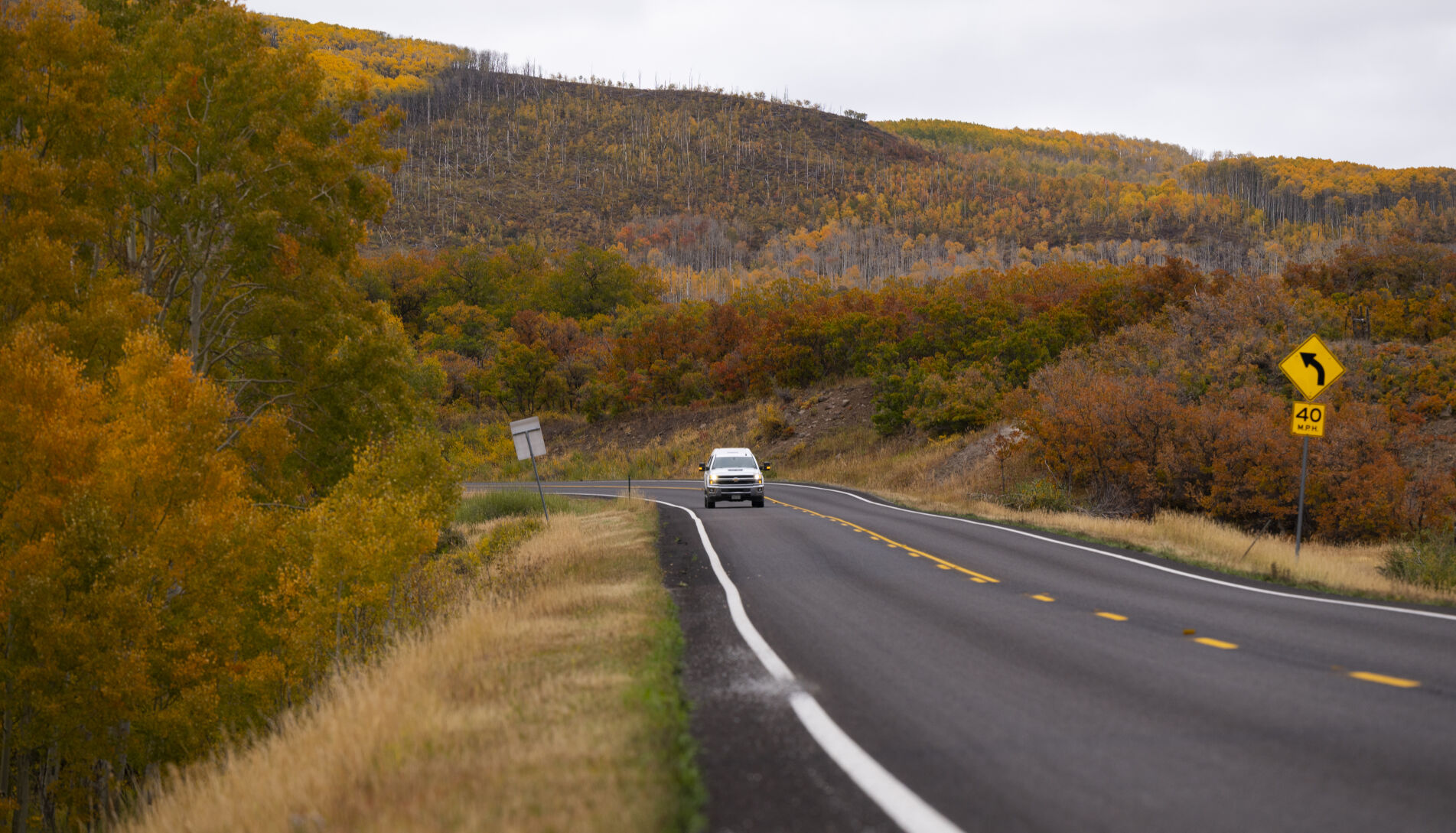 A pickup leaves the Grand Mesa along the Grand Mesa Byway or Colorado 65 toward Cedaredge early this month. (Christian Murdock/The Gazette)
