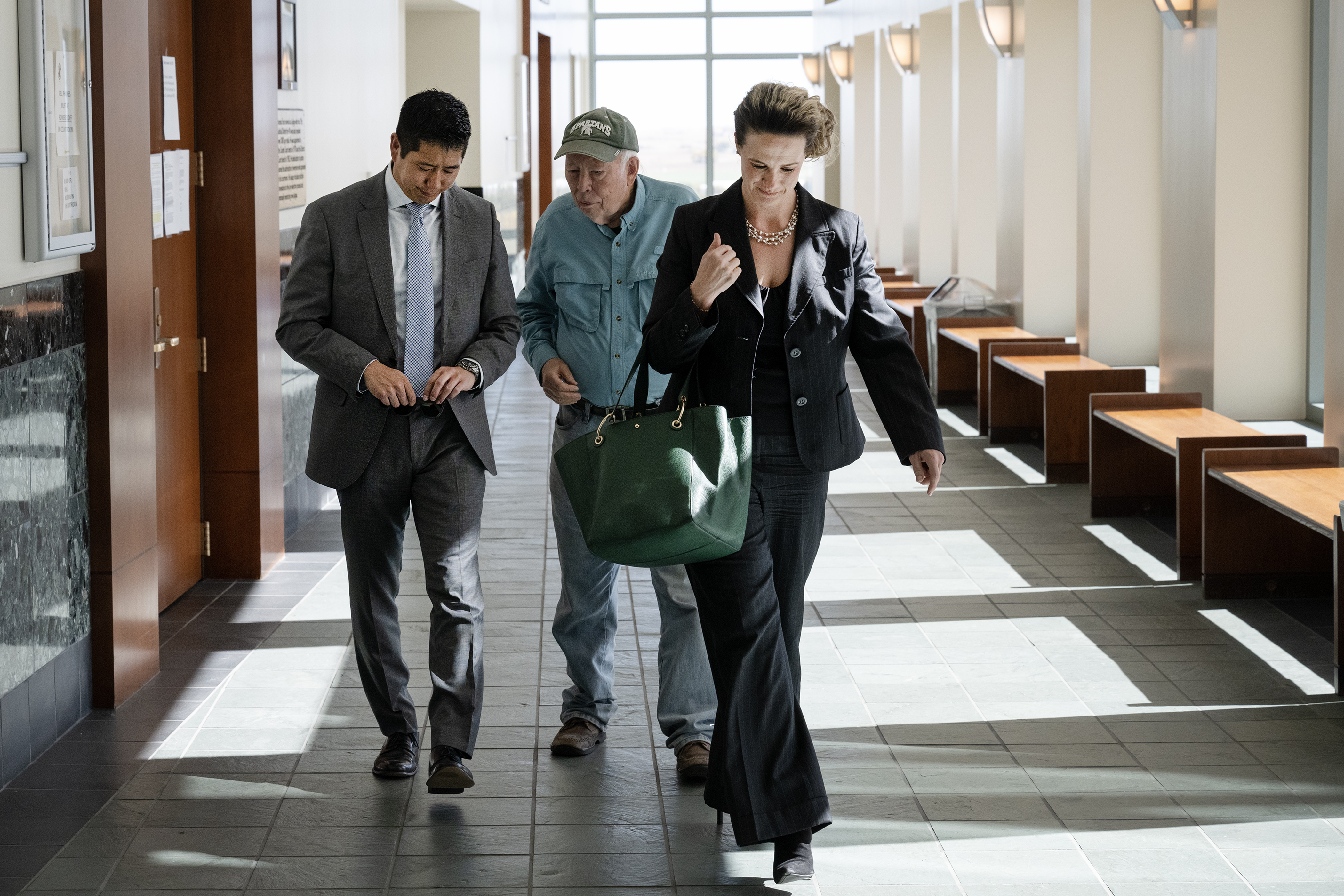 FILE PHOTO: Andrew Ho, left, and Megan Downing, right, defense attorneys for Aurora Officer Nathan Woodyard, leave the courtroom during a break in Woodyard’s trial in connection with the 2019 death of Elijah McClain, on Wednesday, Oct. 18, 2023, at the Adams County Justice Center in Brighton, Colo. (Timothy Hurst/Denver Gazette) (TimHursttim.hurst@gazette.comhttps://secure.gravatar.com/avatar/aca82bd62b4ee425c598527cd6faa1b1?d=mm&r=g)
