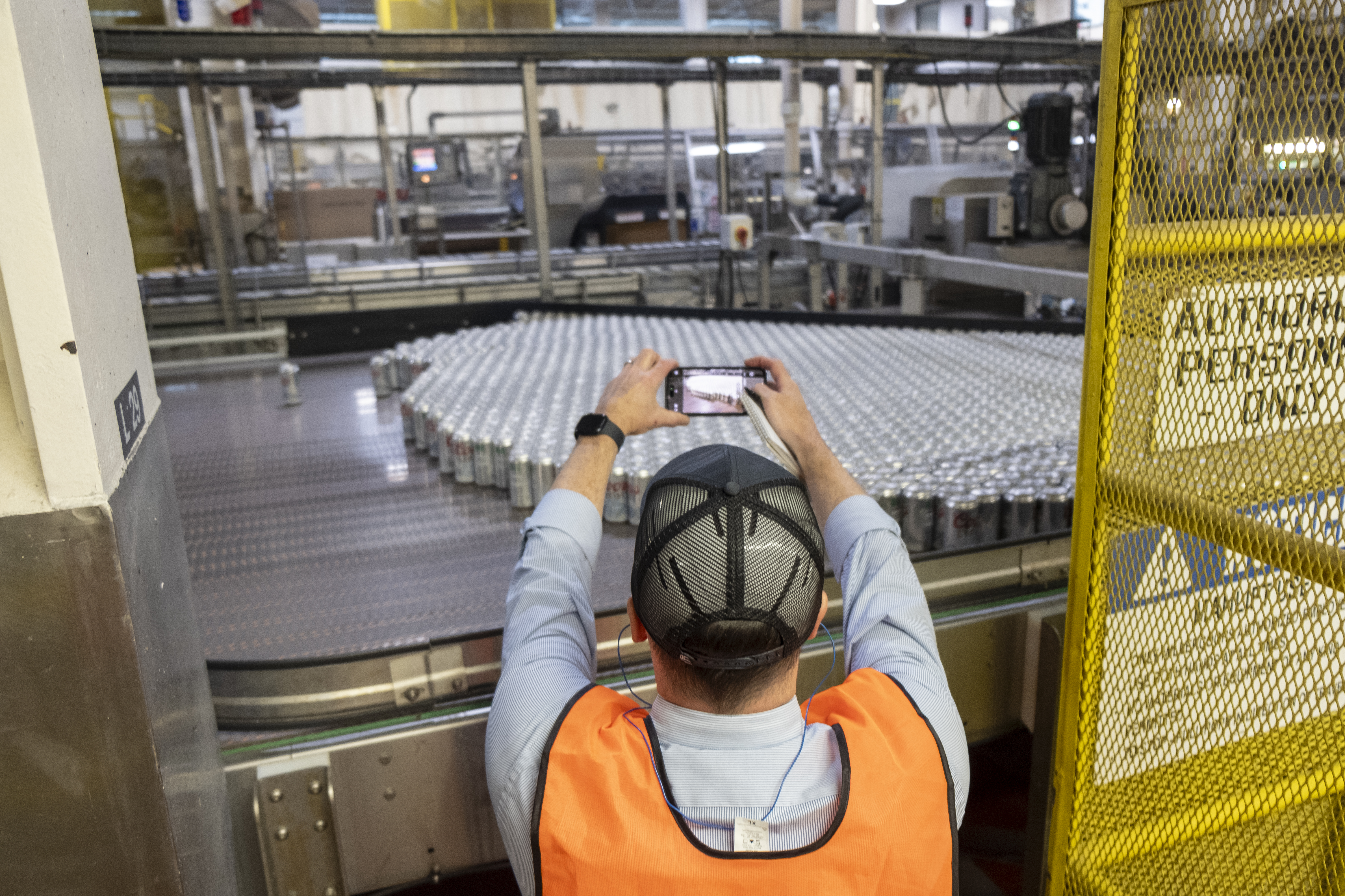 John Frank takes a photo with his cell phone of Coors Light cans on a sorting machine during a tour of the Coors Brewery Tuesday, Sept. 26, 2023 in Golden, Colorado. (JonathanIngrahamDigital Strategistjonathan.ingraham@denvergazette.comhttps://denvergazette.com/content/tncms/avatars/c/dd/7f0/cdd7f086-b693-11ec-b373-bba598953eb6.fc0f5608a6f1144f64f080f771bd904d.png)