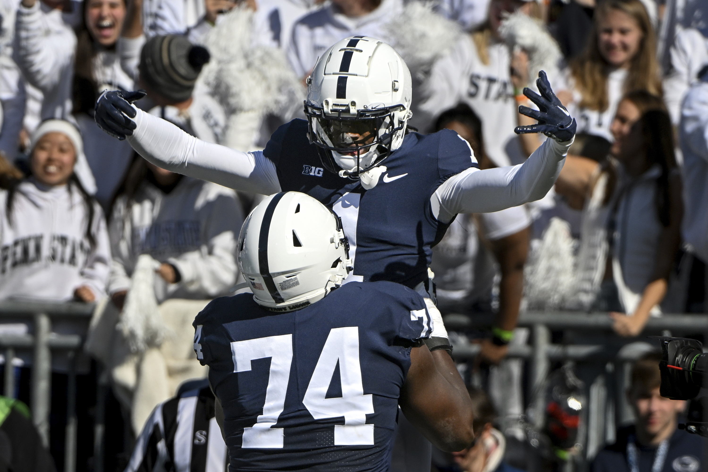 Penn State wide receiver KeAndre Lambert-Smith (1) celebrates with offensive lineman Olumuyiwa Fashanu (74) after scoring a touchdown against Ohio State during the first half of an NCAA college football game, Saturday, Oct. 29, 2022, in State College, Pa. (AP Photo/Barry Reeger) (Barry Reeger)
