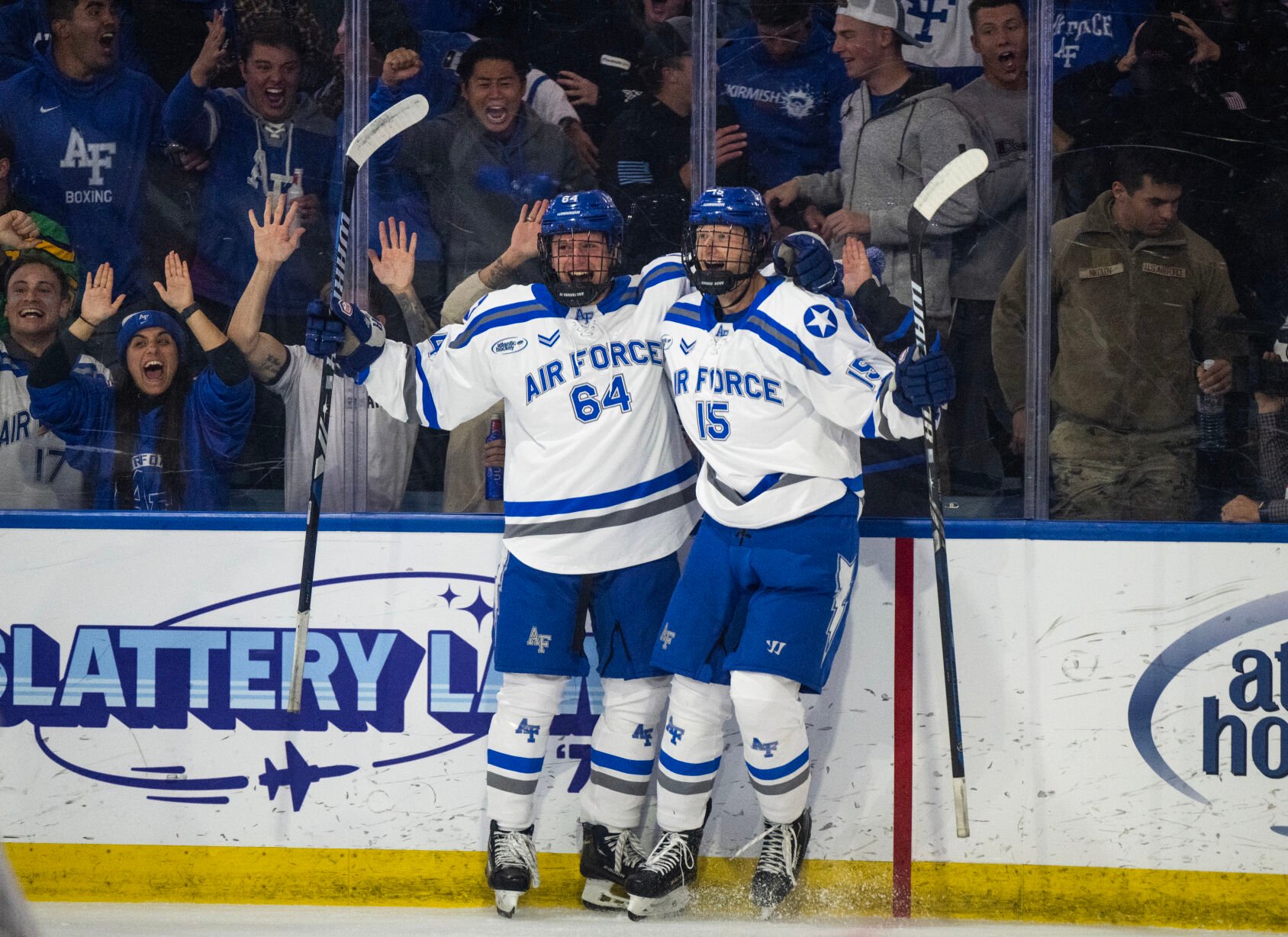 Air Force forwards Owen Dubois (15) and Brendan Gibbons (64) celebrate scoring a goal in the first period of an NCAA college hockey game against Michigan St. Thursday, Oct. 12, 2023, at the Cadet Ice Arena on the Air Force Academy in Colorado Springs, Colo. Both freshman players scored their first goals as members of the Air Force Academy hockey team during the game. (Parker Seibold, The Gazette) (Parker Seibold)