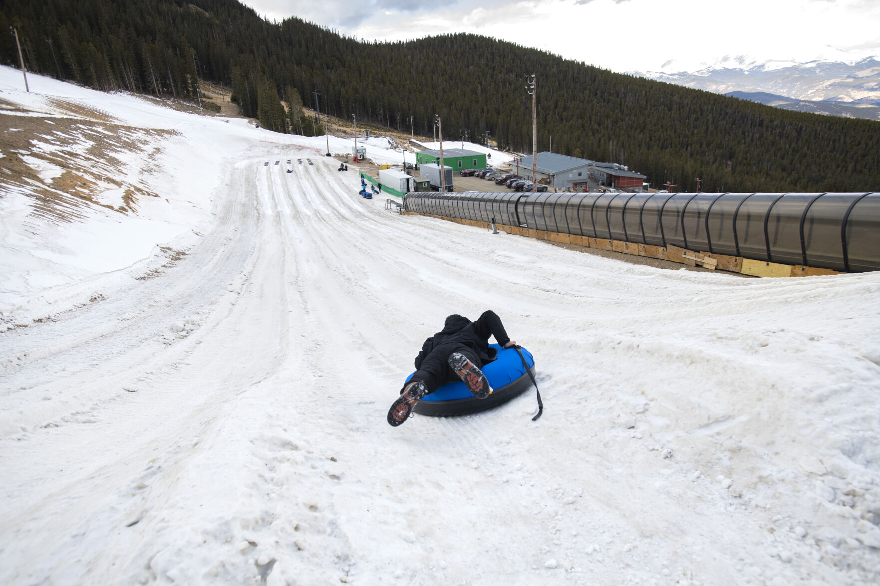 Christian Blanco slides down the tubing hill at Echo Mountain on Dec. 9. (Echo Mountain. Christian Murdock)