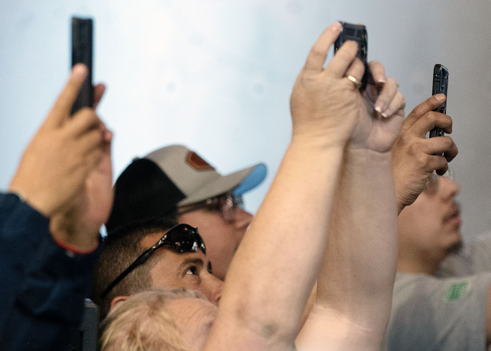 Employees at CS Wind in Pueblo take video of Pres. Joe Biden while he makes remarks at CS Wind on Wednesday, Nov. 29, 2023. (Photo by Jerilee Bennett, The Gazette)