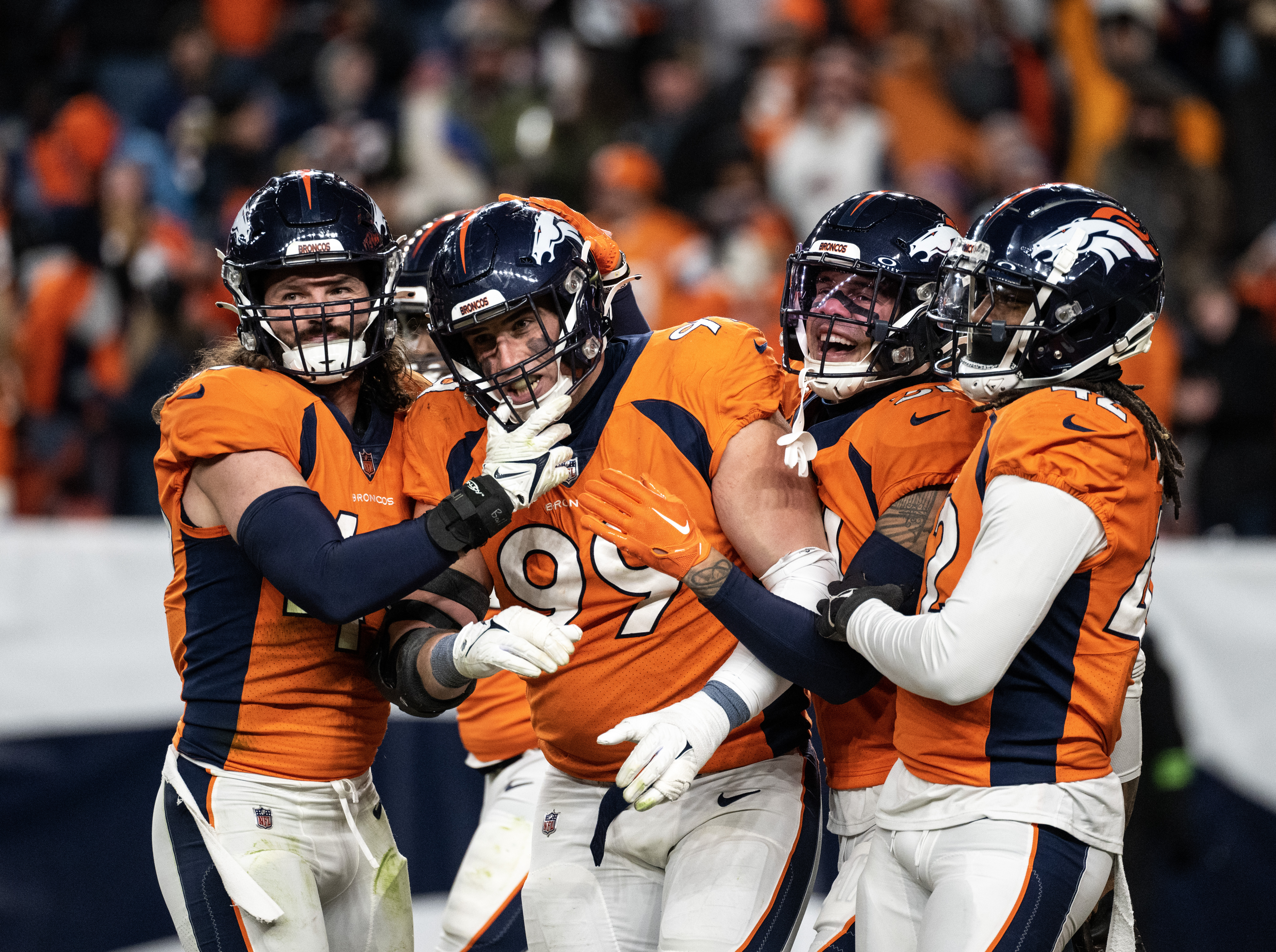 Broncos defensive end Zach Allen (99) celebrates with teammates after sacking Cleveland Browns quarterback PJ Walker (10) in the fourth quarter of a game on Sunday, Nov. 26, 2023, at Empower Field at Mile High in Denver, Colo. The Broncos defeated the Cleveland Browns 29-12 for their fifth win in a row. (Parker Seibold, The Gazette) (Parker Seibold)