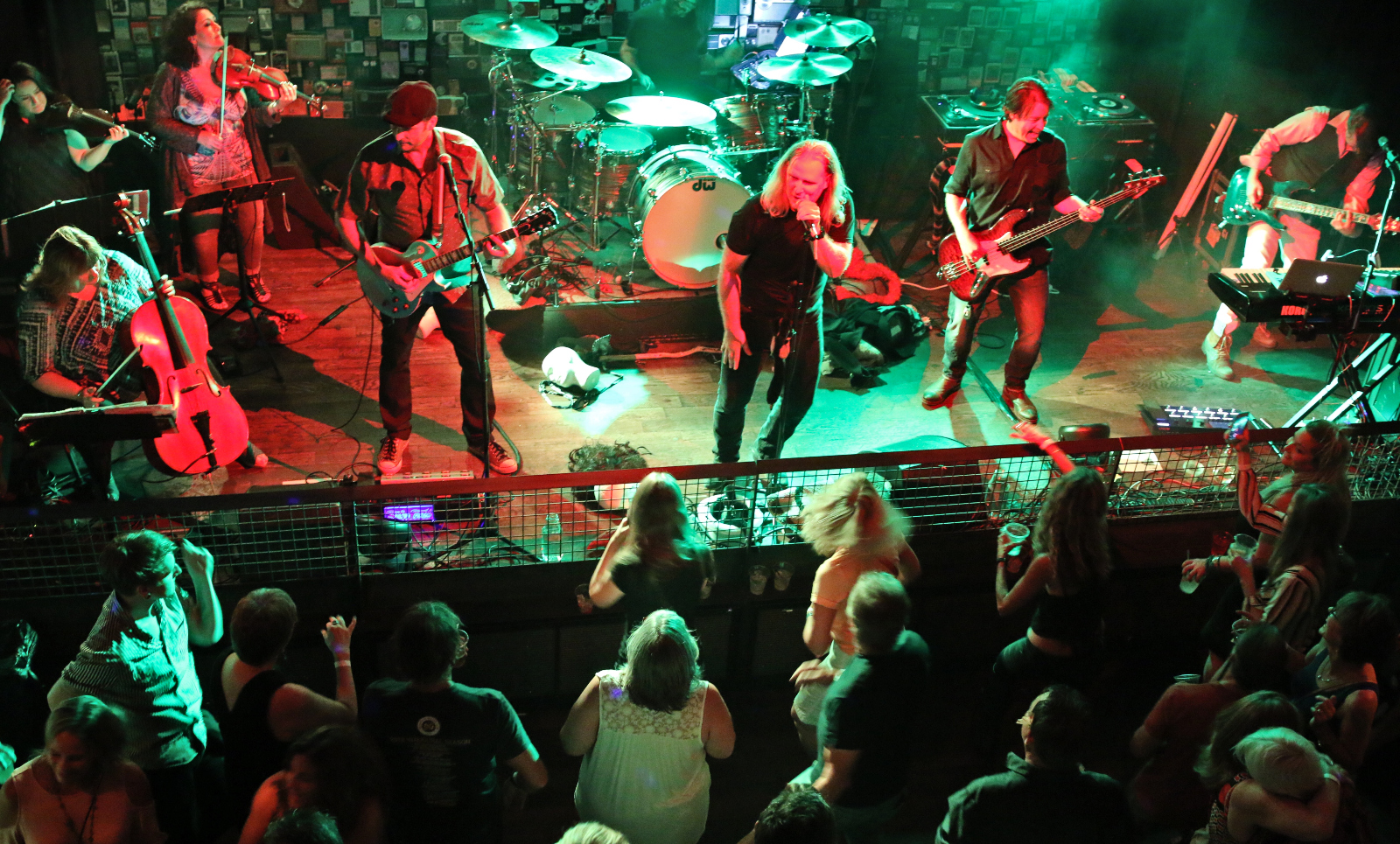Local actor Mark Devine, center, is the frontman of the band 1970s tribute band Mr. Majestyk’s 8-Track Revival, which is about to play its final show. The band is pictured here in 2018 at Ophelia's. (JOHN MOORE/DENVER GAZETTE)