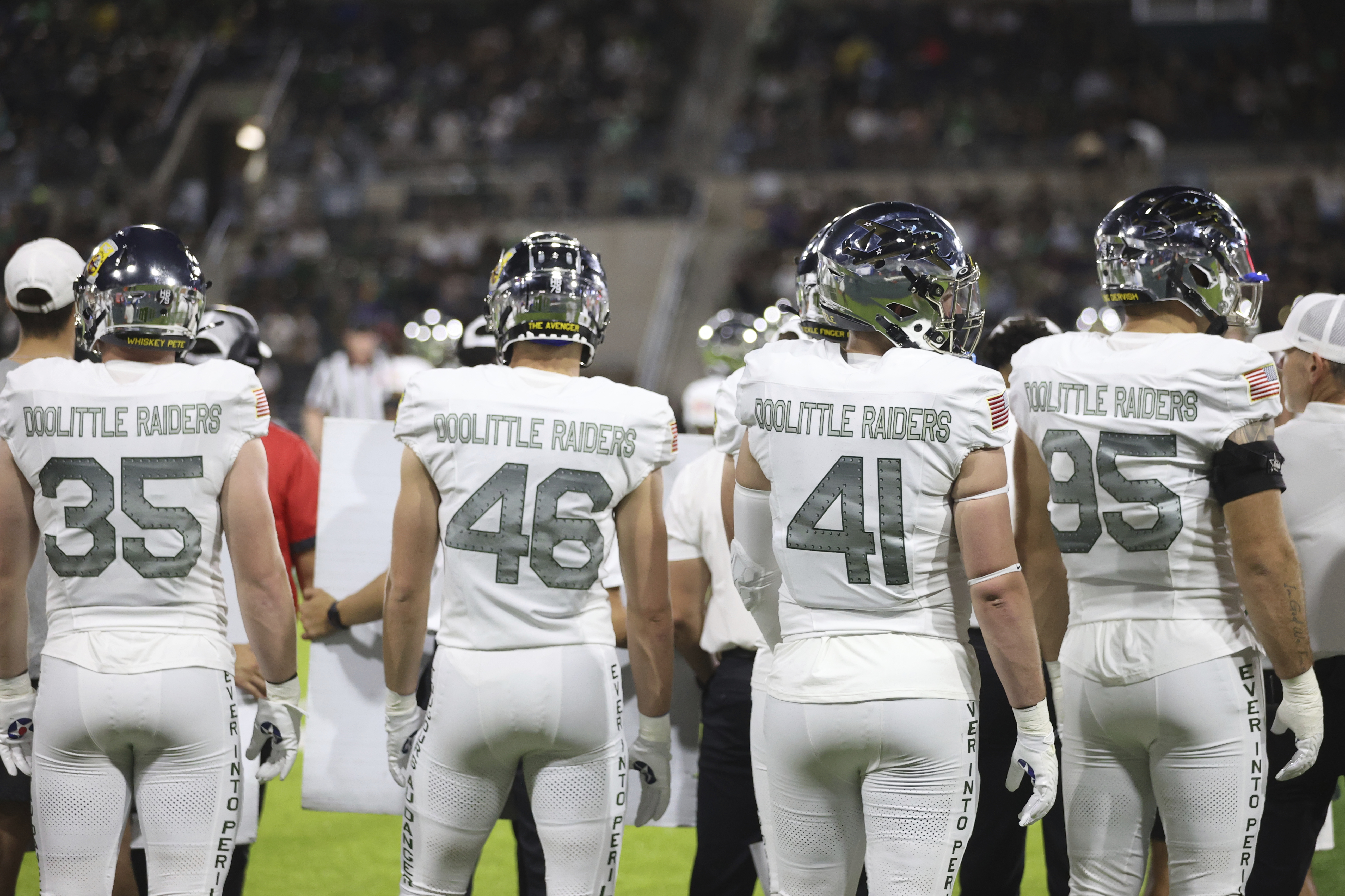 Air Force football players wear jerseys with the phrase