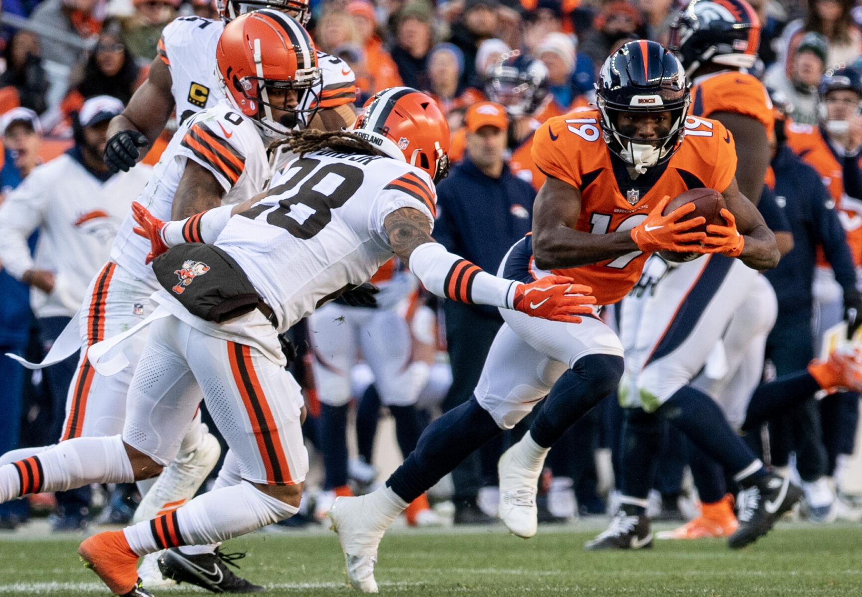 Broncos wide receiver Marvin Mims Jr. runs the ball after making a catch in the first half Sunday in Denver. (Parker Seibold, The Gazette) (Parker Seibold, The Gazette)