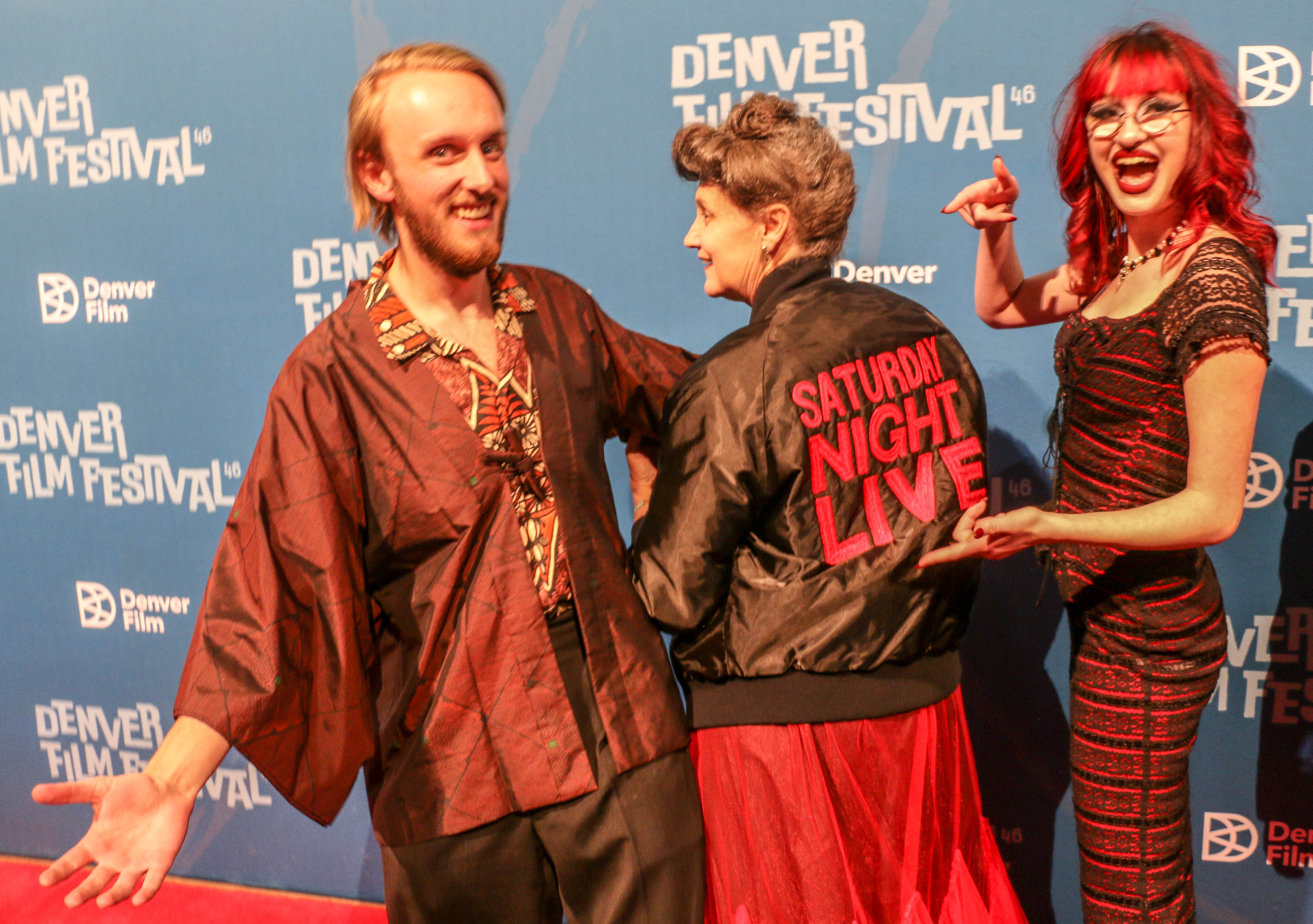 Walking the red carpet outside the Ellie Caulkins Opera House on the opening night of the 46th Denver Film Festival on Nov. 2, 2023, were directors Aiden Nelson and Violet Dempsey with Eileen O'Brien, subject of their short documentary 