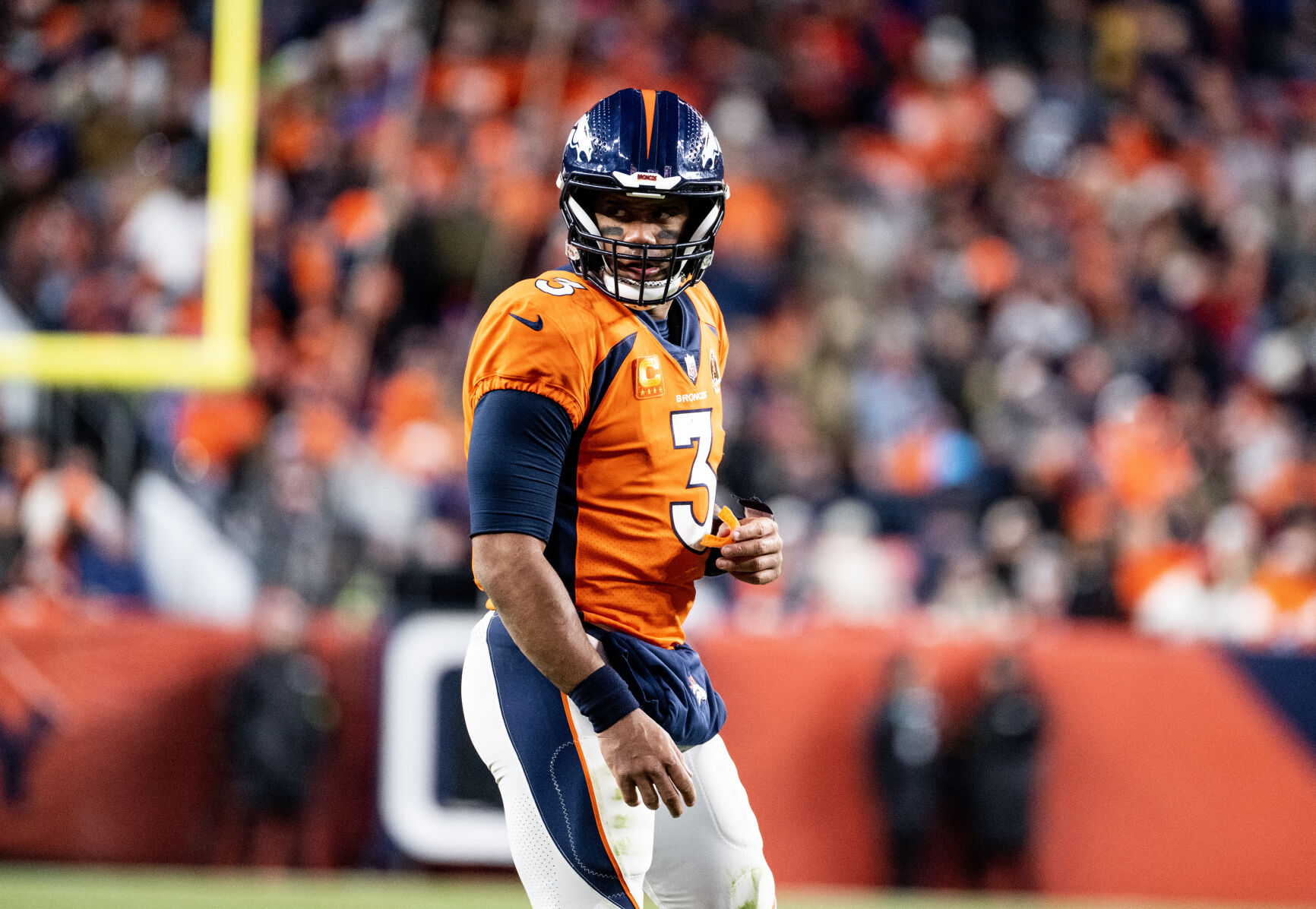 Denver Broncos quarterback Russell Wilson (3) looks to the sideline during a timeout in the second half of a game on Sunday, Nov. 26, 2023, at Empower Field at Mile High in Denver, Colo. (Parker Seibold, The Gazette) (Parker Seibold)