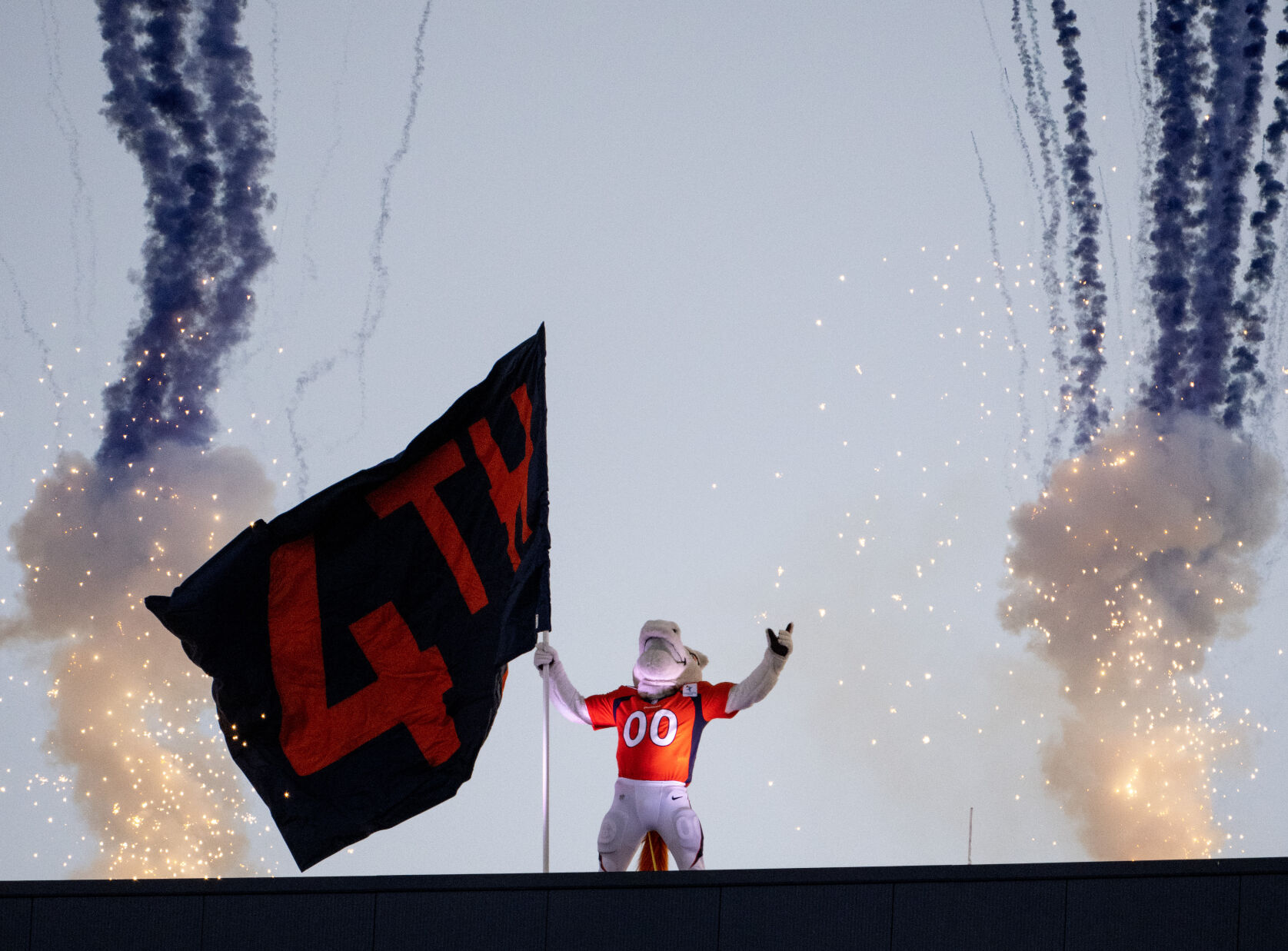 The Denver Broncos mascot Miles waves a flag from above the big screen in the fourth quarter of a game on Sunday, Nov. 26, 2023, at Empower Field at Mile High in Denver, Colo. (Parker Seibold, The Gazette) (Parker Seibold)