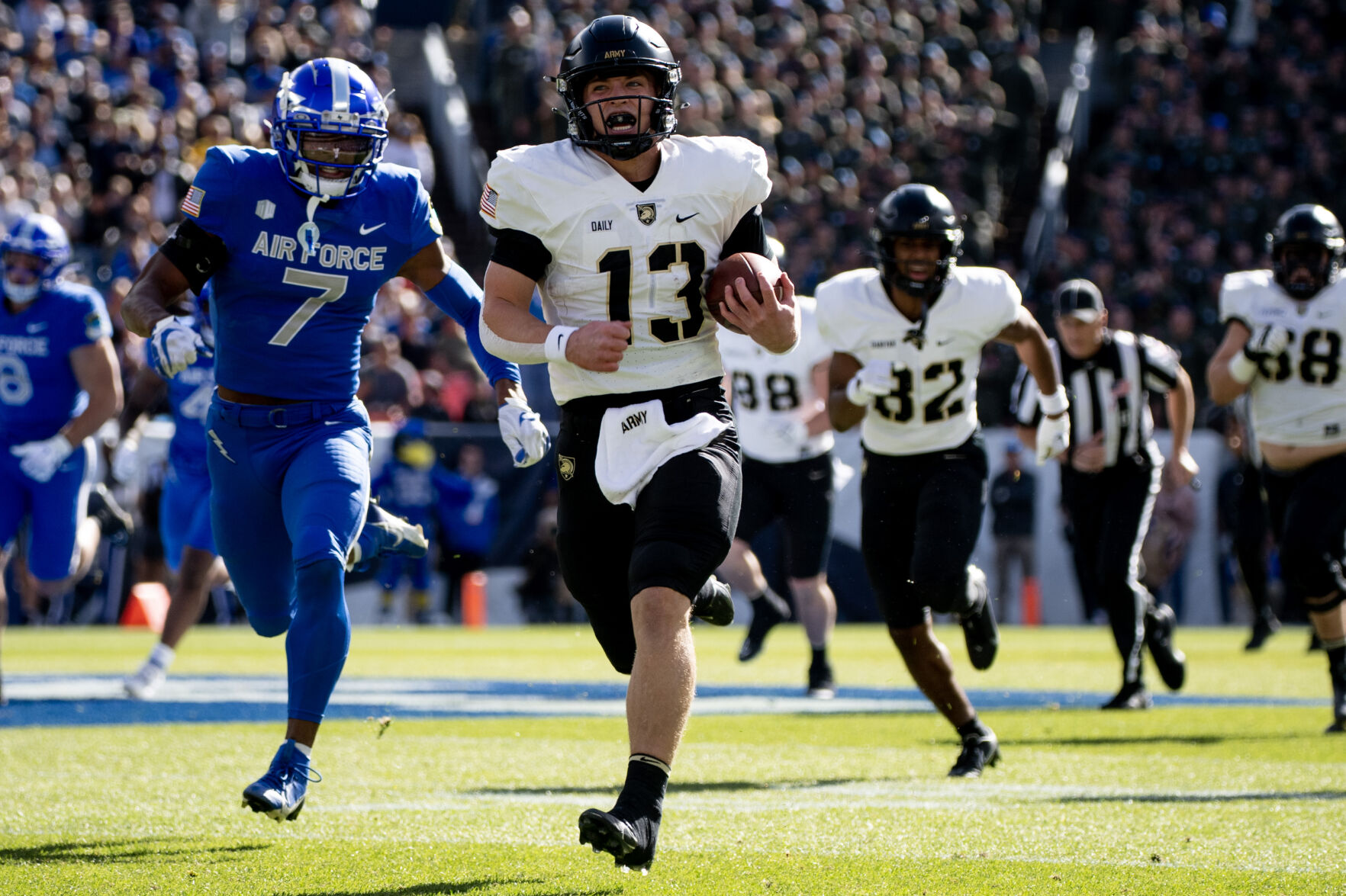 Army Black Knights quarterback Bryson Daily (13) runs the ball in for a touchdown in the first half of an NCAA college football game on Saturday, Nov. 4, 2023, at Empower Field at Mile High in Denver, Colo. (Parker Seibold, The Gazette) (Parker Seibold)