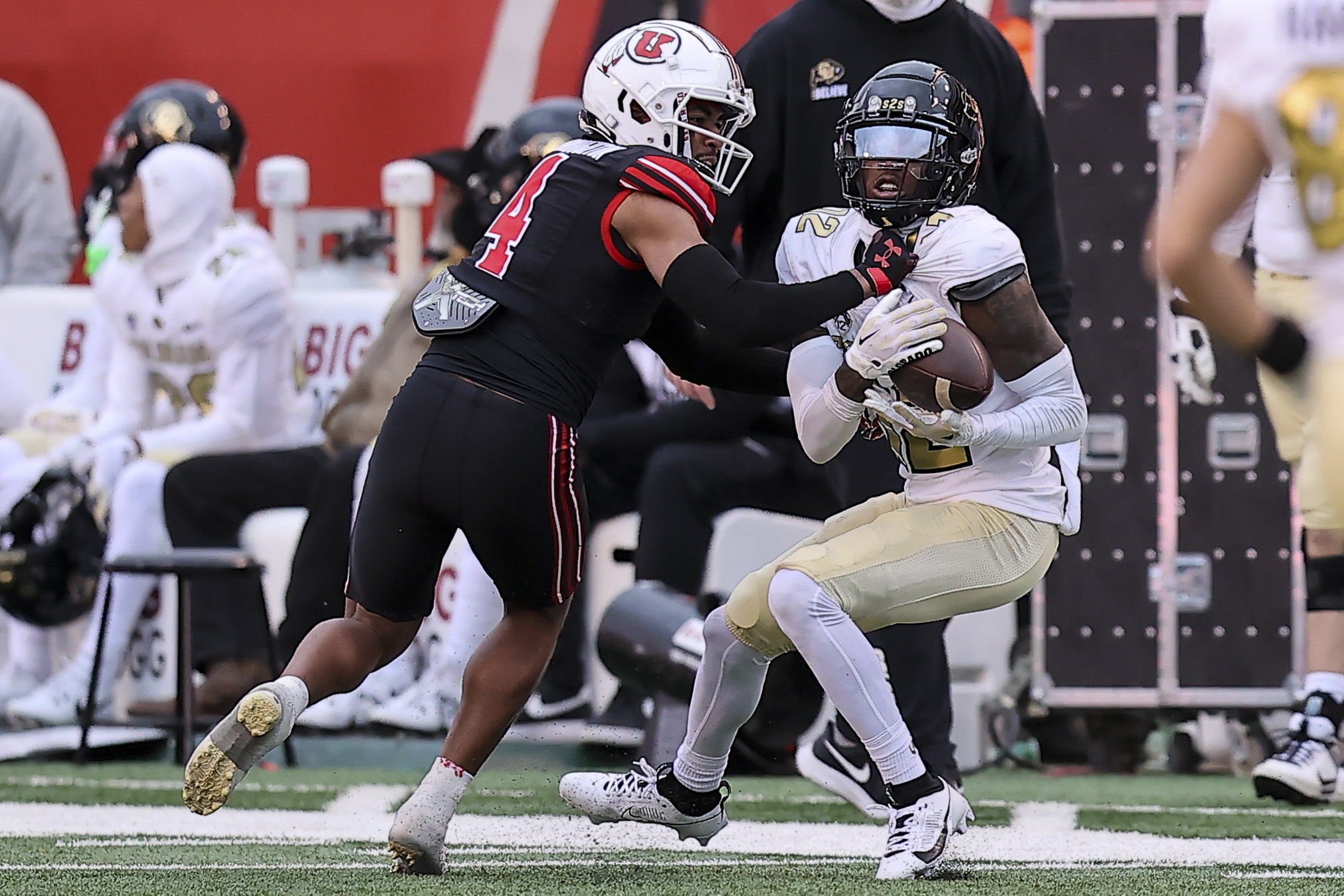 Colorado safety Shilo Sanders catches a ball against Utah cornerback JaTravis Broughton during the second half of an NCAA college football game, Saturday, Nov. 25, 2023, in Salt Lake City. (AP Photo/Rob Gray) (Rob Gray)