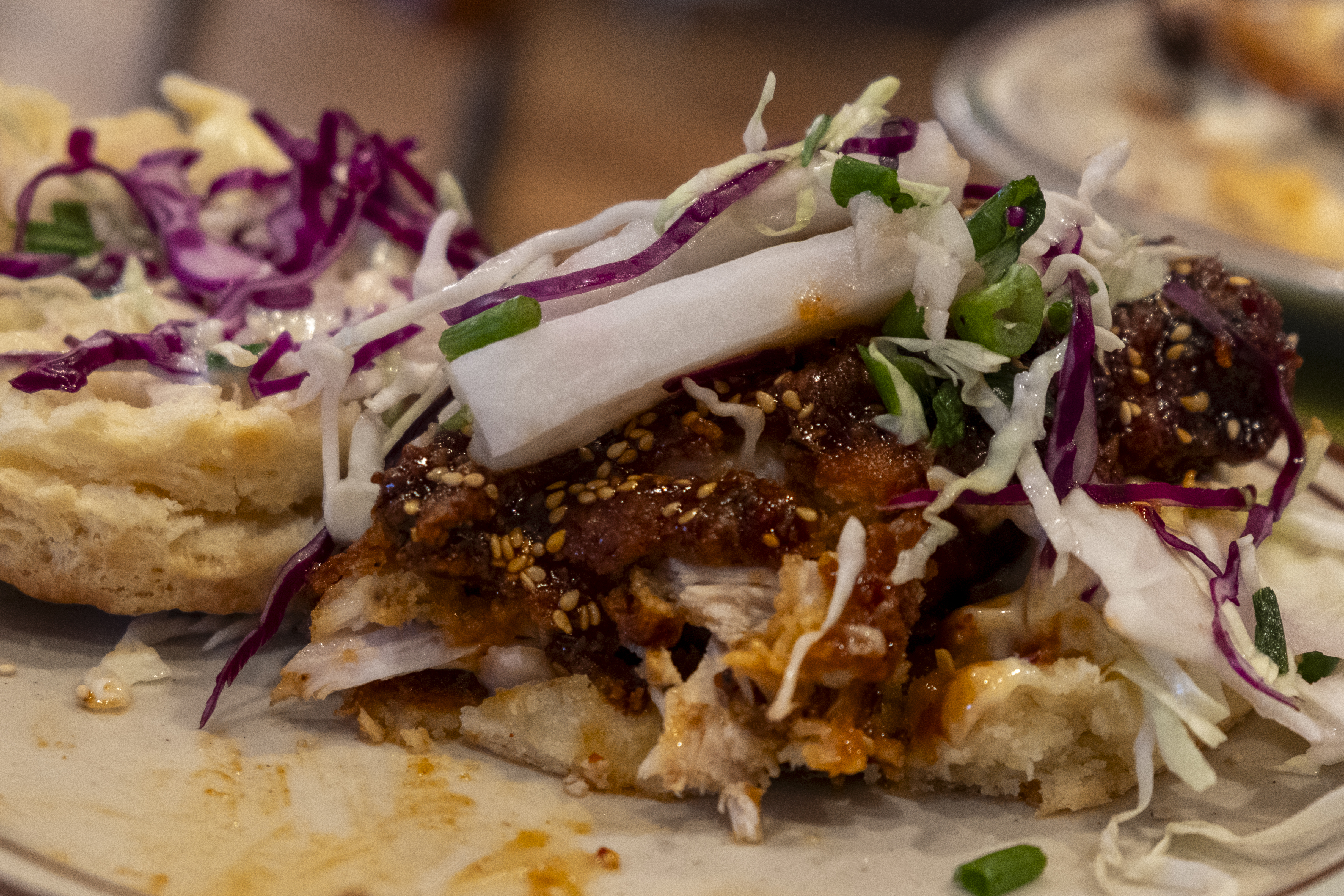A Korean Fried Chicken Biscuit sandwich, an offering from Denver Biscuit Company and one new item on the menu at the Atomic Cowboy, blends fried chicken with sesame mayo and Daikon radish, is served at Atomic Cowboy Golden Tuesday, Nov. 8, 2023 in Golden, Colorado. (JonathanIngrahamDigital Strategistjonathan.ingraham@denvergazette.comhttps://denvergazette.com/content/tncms/avatars/c/dd/7f0/cdd7f086-b693-11ec-b373-bba598953eb6.fc0f5608a6f1144f64f080f771bd904d.png)