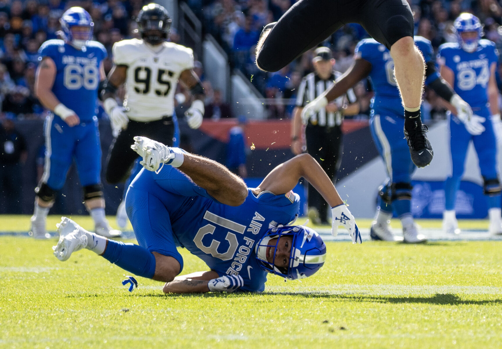 Air Force Falcons wide receiver Jared Roznos (13) tumbles in the first half of an NCAA college football game on Saturday, Nov. 4, 2023, at Empower Field at Mile High in Denver, Colo. (Parker Seibold, The Gazette) (Parker Seibold)