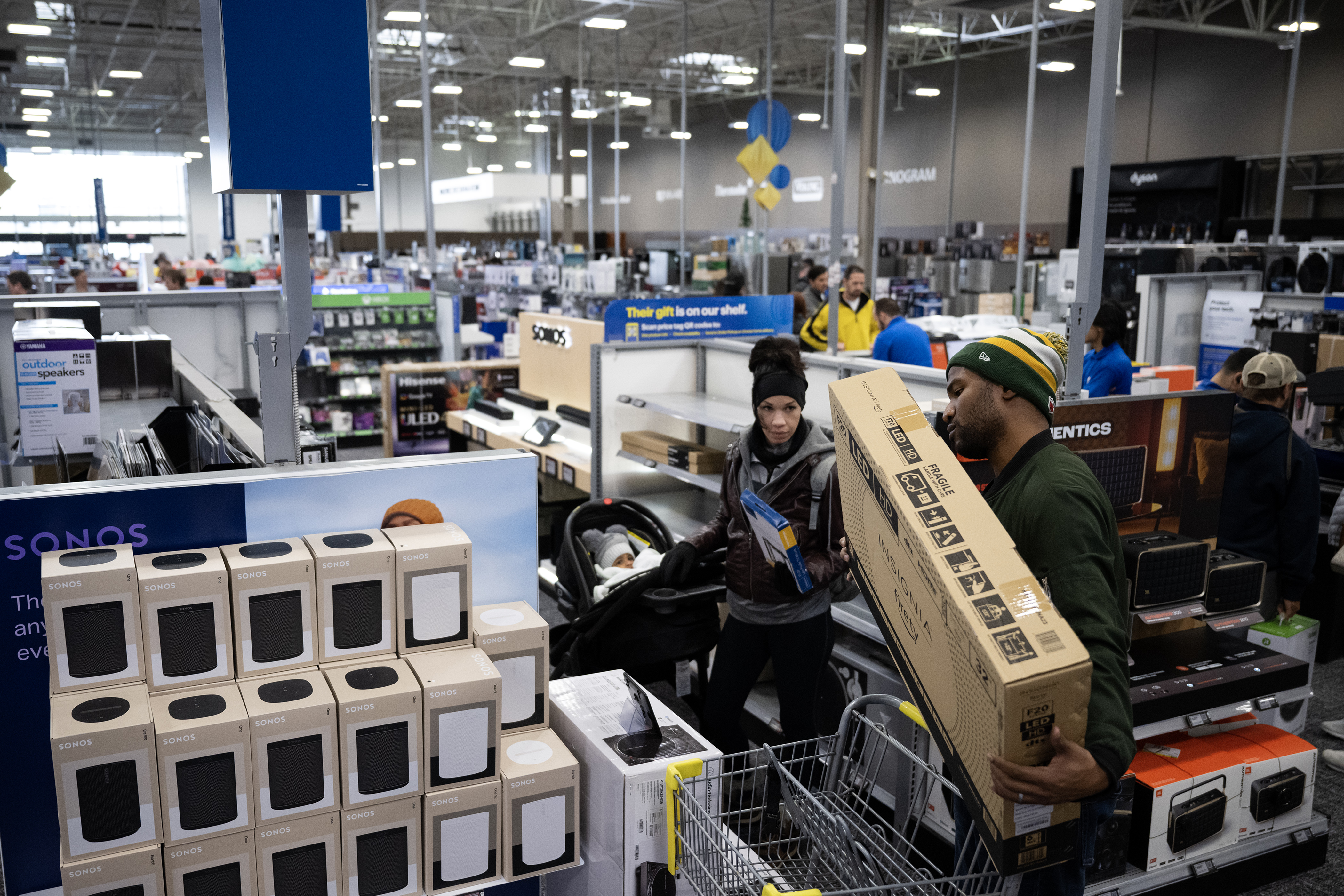 Denzel and Nicole, no last names given, look for a television for their four-year-old son Ian at Best Buy on Thursday, Nov. 24, 2023, in Lone Tree, Colo. (Timothy Hurst/Denver Gazette) (TimHursttim.hurst@gazette.comhttps://secure.gravatar.com/avatar/aca82bd62b4ee425c598527cd6faa1b1?d=mm&r=g)