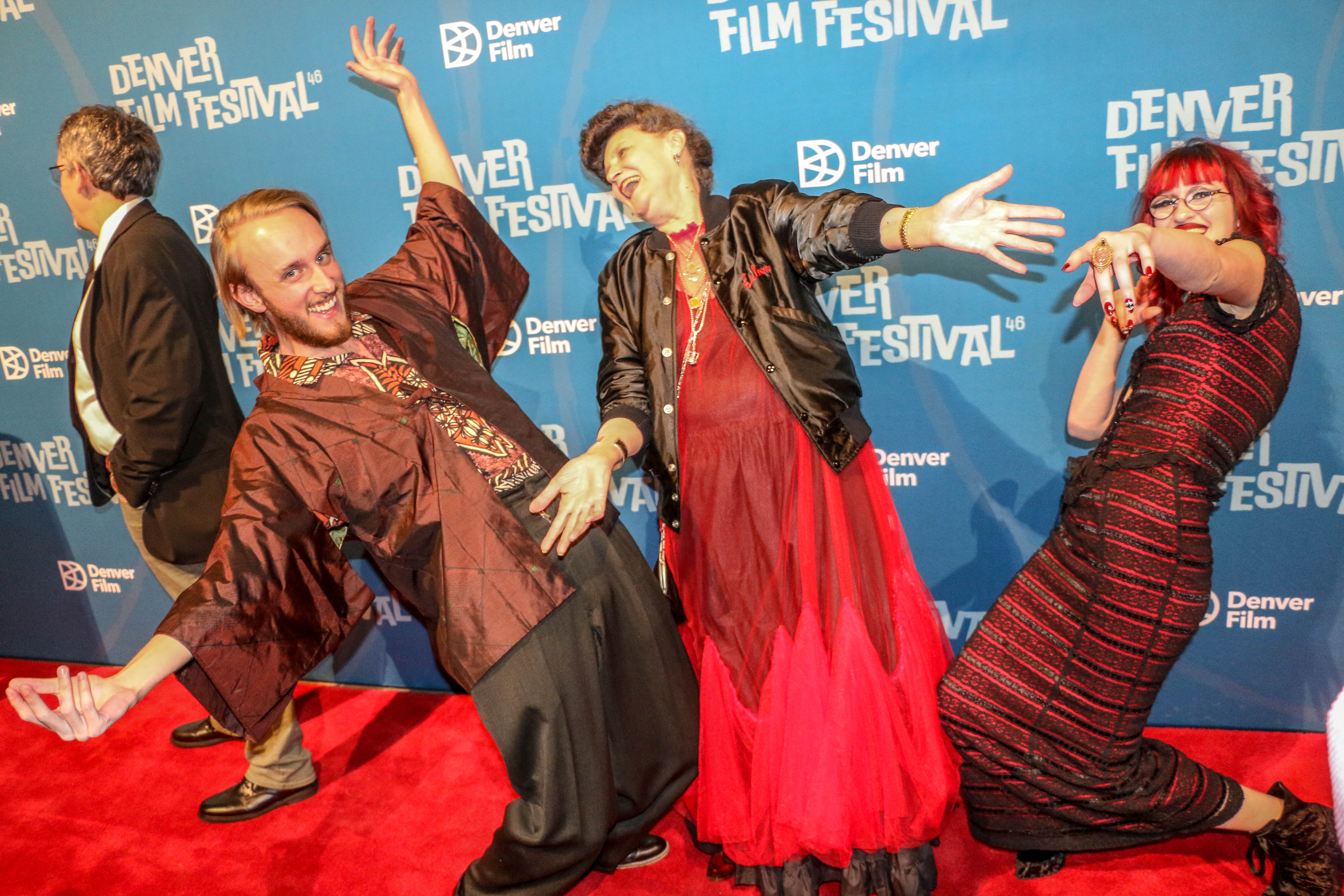 Walking the red carpet outside the Ellie Caulkins Opera House on the opening night of the 46th Denver Film Festival on Nov. 2, 2023, were directors Aiden Nelson and Violet Dempsey with Eileen O'Brien, center, subject of their short documentary 