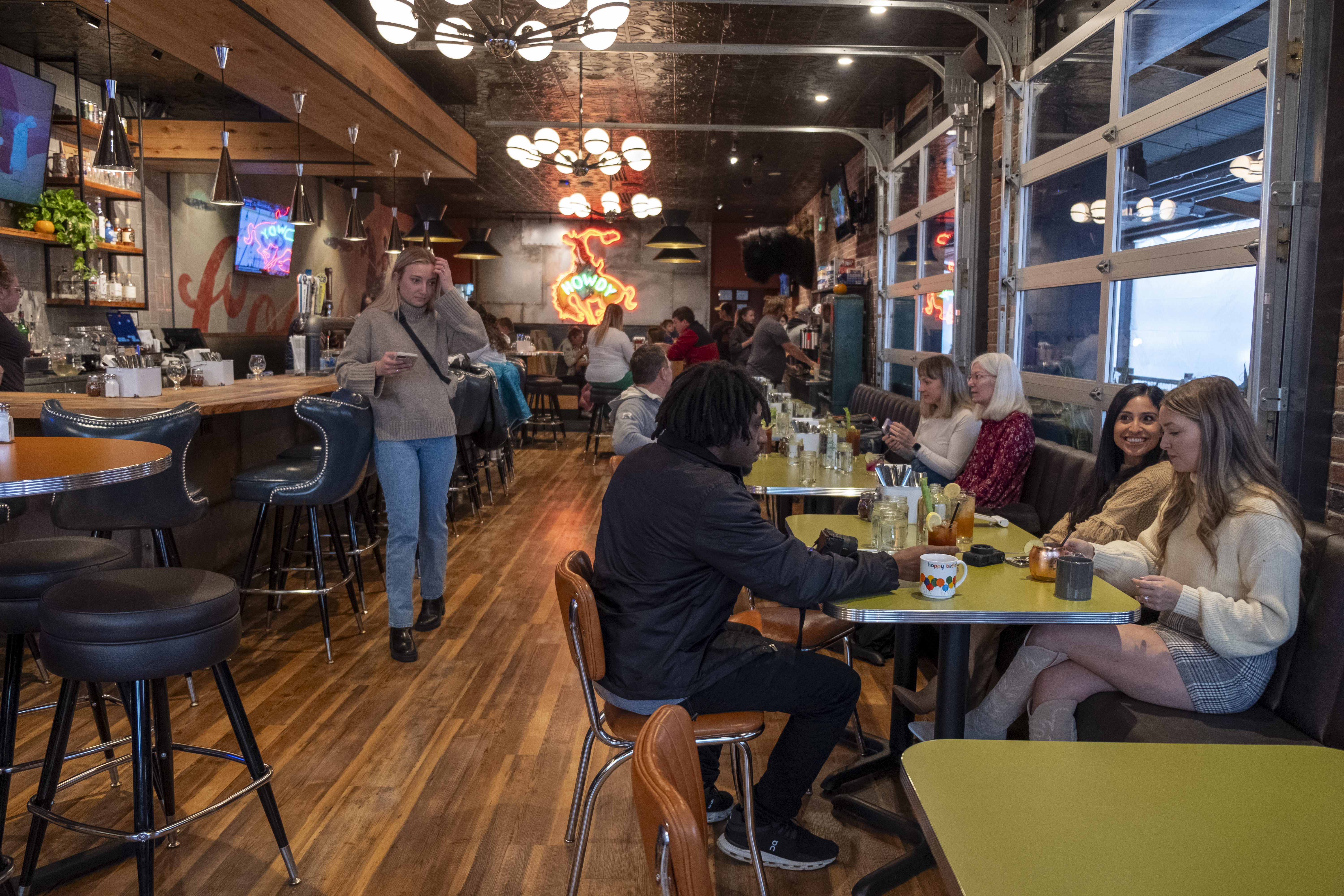Patrons sit and eat inside the Atomic Cowboy restaurant Wednesday, Nov. 8, 2023 in Golden, Colorado. The restaurant offers Denver Biscuit Company and Fat Sully's food offerings and is the newest addition to the Atomic Cowboy franchise (opened late-Oct. 2023) owner and founder Drew Shader started in 2004. (JonathanIngrahamDigital Strategistjonathan.ingraham@denvergazette.comhttps://denvergazette.com/content/tncms/avatars/c/dd/7f0/cdd7f086-b693-11ec-b373-bba598953eb6.fc0f5608a6f1144f64f080f771bd904d.png)