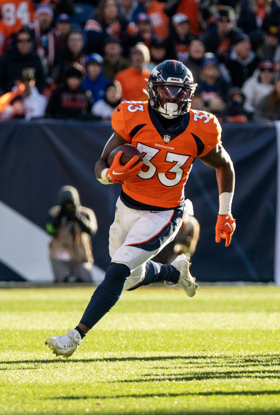 Denver Broncos running back Javonte Williams (33) runs the ball in the first half of a game on Sunday, Nov. 26, 2023, at Empower Field at Mile High in Denver, Colo. (Parker Seibold, The Gazette) (Parker Seibold)