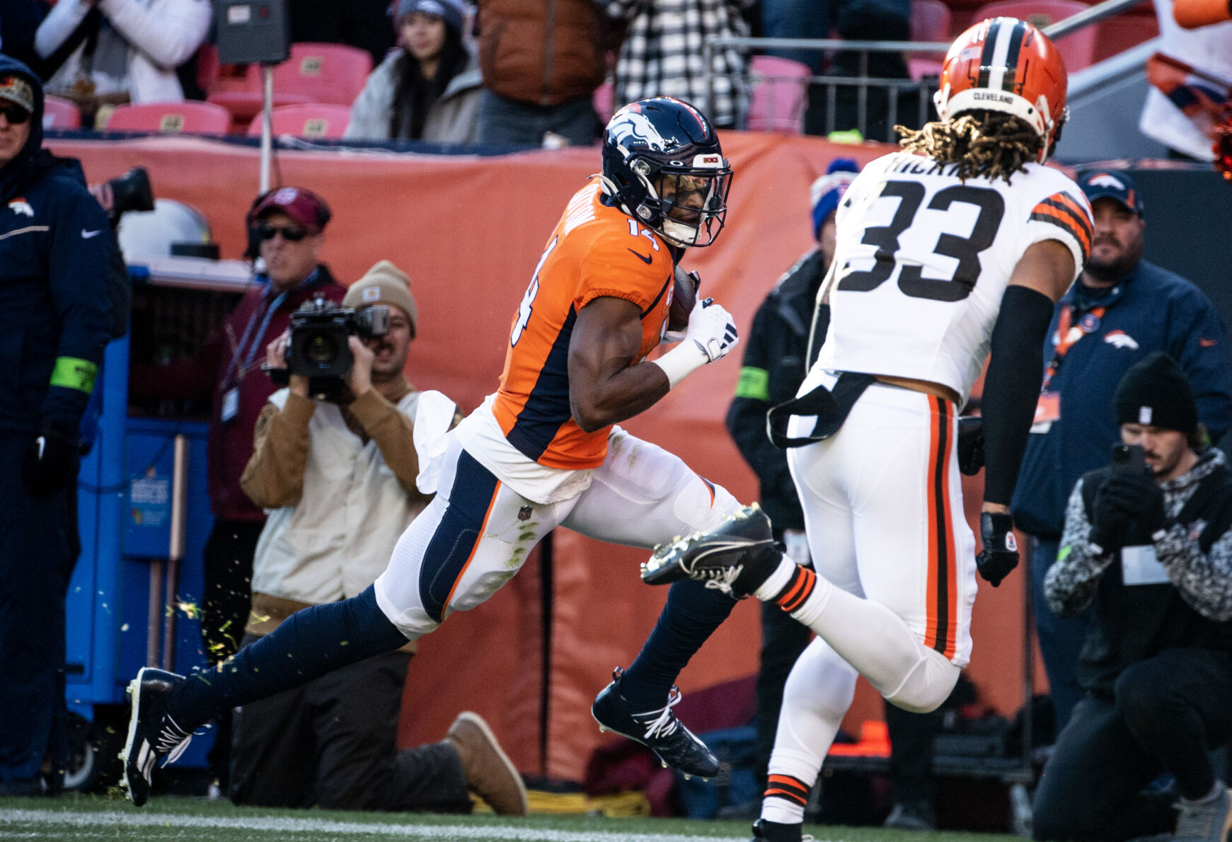 Denver Broncos wide receiver Courtland Sutton (14) runs the ball for a first down in the first half of a game on Sunday, Nov. 26, 2023, at Empower Field at Mile High in Denver, Colo. (Parker Seibold, The Gazette) (Parker Seibold)