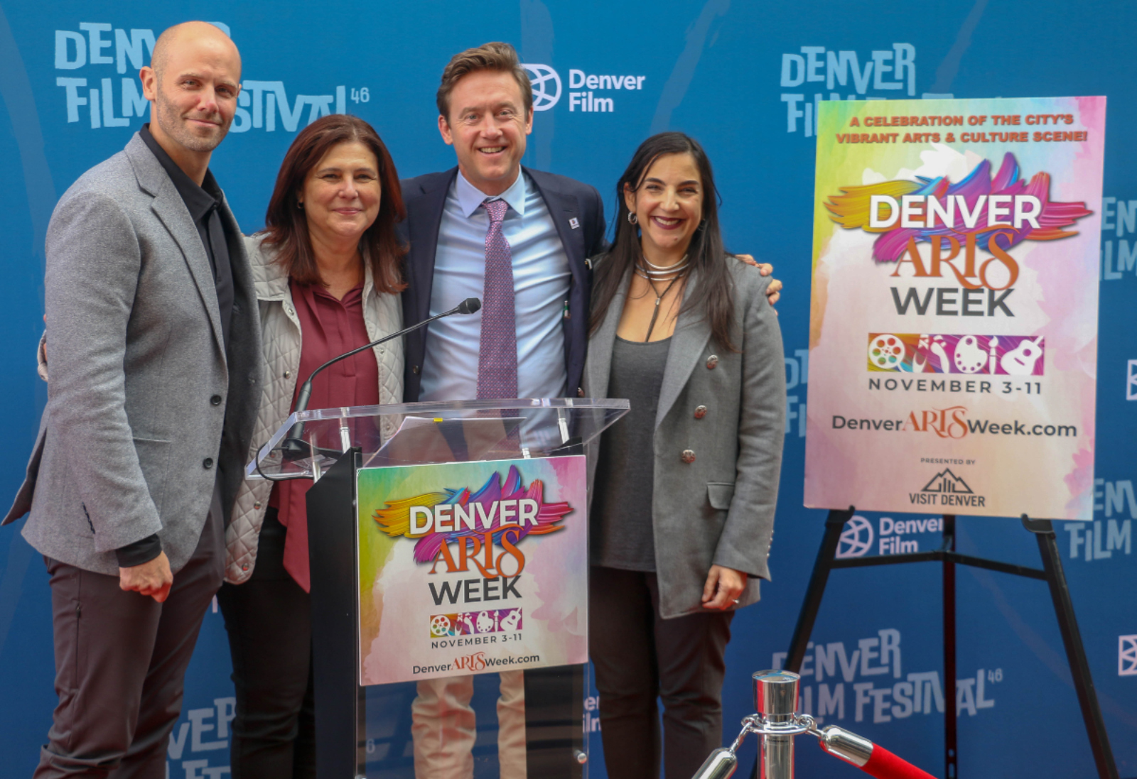 Kicking off Denver Arts Week on Nov. 3, 2023, from left: Denver Film CEO Kevin Smith, Visit Denver Vice President of Tourism Flavia Light, Denver Mayor Mike Johnston, and Denver Arts & Venues Director of Cultural Affairs Tariana Navas-Nieves. (JOHN MOORE/DENVER GAZETTE)