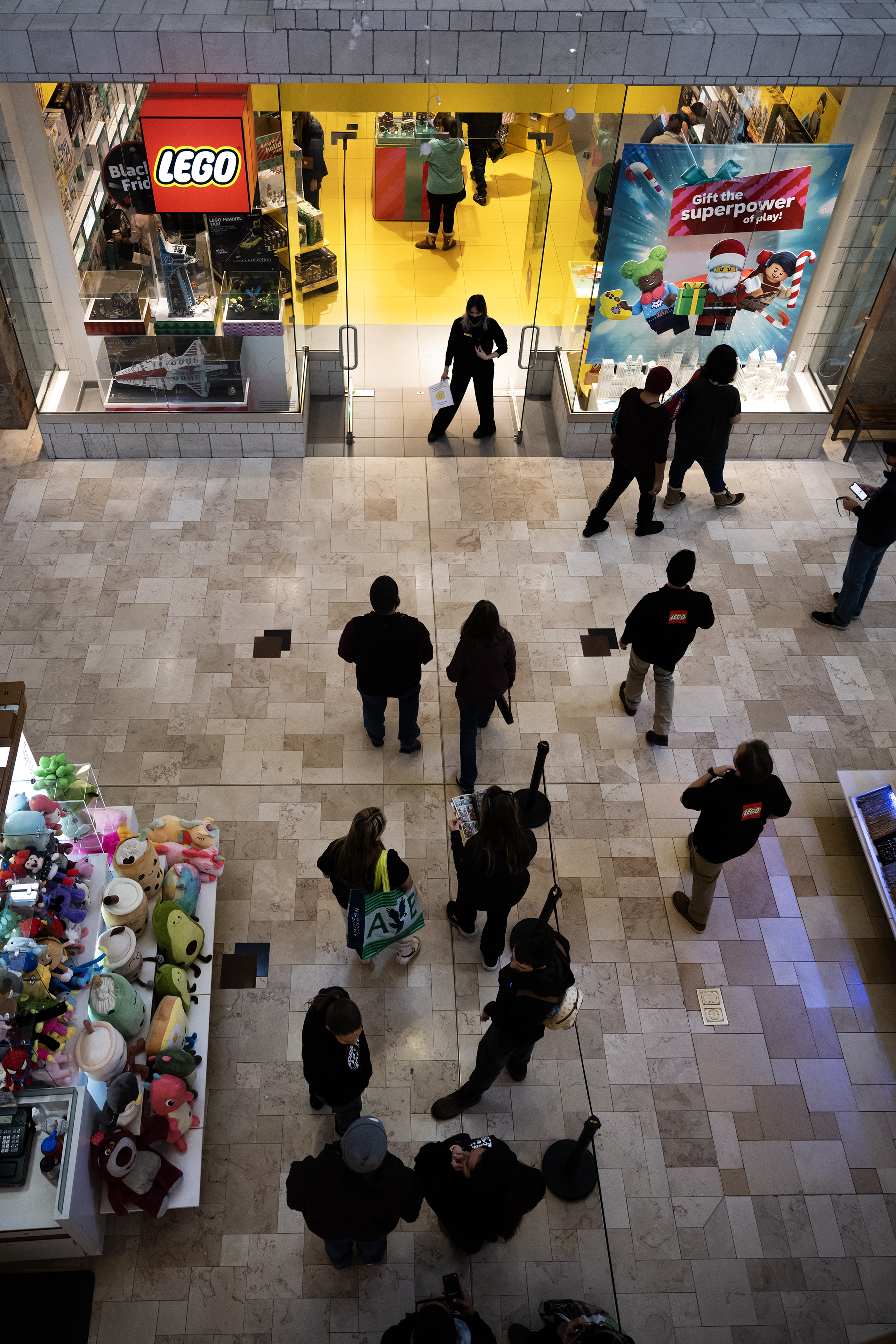 Customers wait in line before being able to shop at The LEGO Store at the Park Meadows Shopping Center on Thursday, Nov. 24, 2023, in Lone Tree, Colo. (Timothy Hurst/Denver Gazette) (TimHursttim.hurst@gazette.comhttps://secure.gravatar.com/avatar/aca82bd62b4ee425c598527cd6faa1b1?d=mm&r=g)