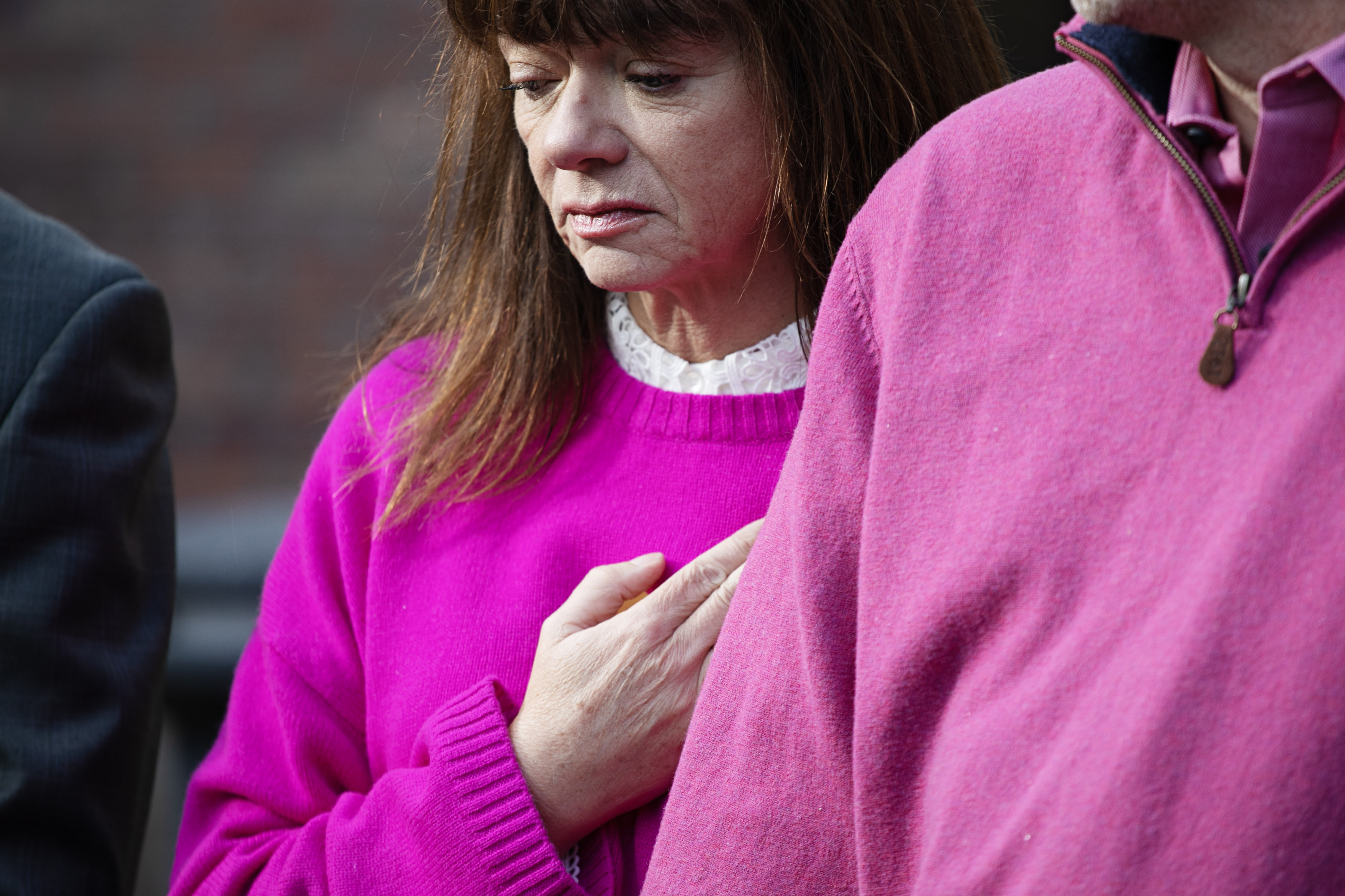 Sally Glass holds a heart-shaped stone over her chest which she told reporters was to remind her to have kindness and compassion moments after former Clear Creek County Sheriff's Office Sgt. Kyle Gould pled guilty to criminally negligent homicide and reckless endangerment in Georgetown, Colo. on Nov. 16, 2023. (TomHellauerMultimedia Producertom.hellauer@denvergazette.comhttps://denvergazette.com/content/tncms/avatars/f/9e/622/f9e6228a-3b6b-11ed-bf10-fbb71fa8e421.f54b911252c540f1d61709edc4727a39.png)