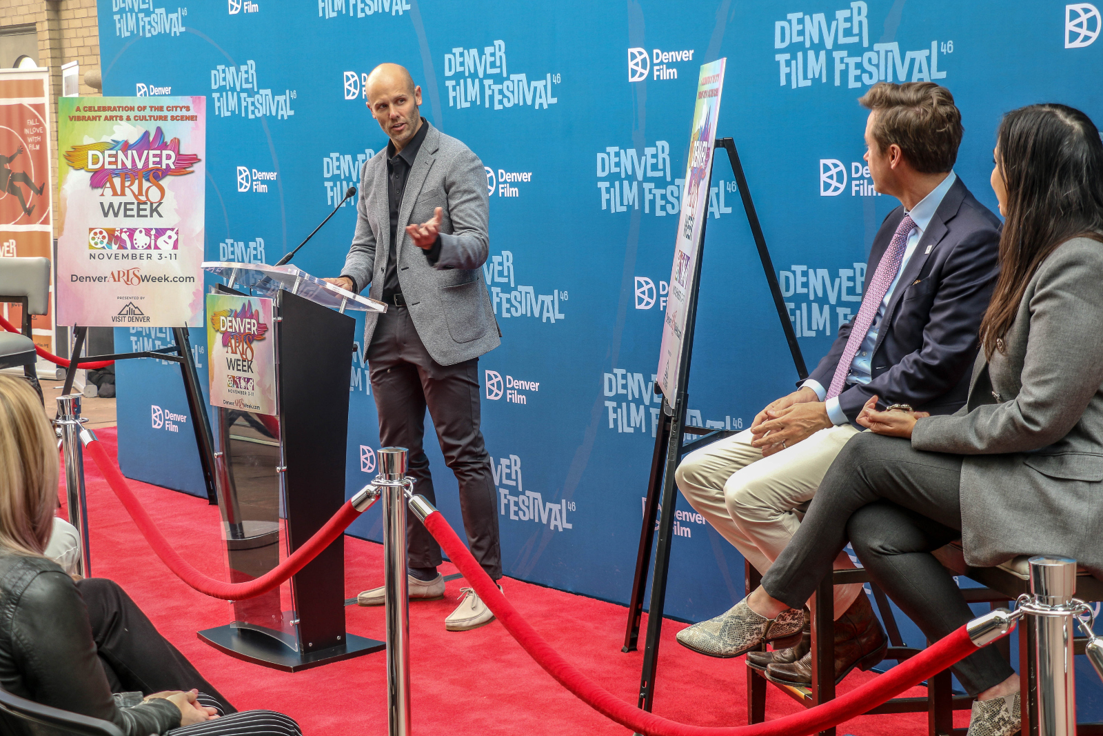 Denver Film CEO Kevin Smith speaks at a press conference announcing the start of  Denver Arts Week on Nov. 3, 2023, outside the Ellie Caulkins Opera House. He's with Denver Mayor Mike Johnston and Denver Arts & Venues Director of Cultural Affairs Tariana Navas-Nieves. (JOHN MOORE/DENVER GAZETTE)