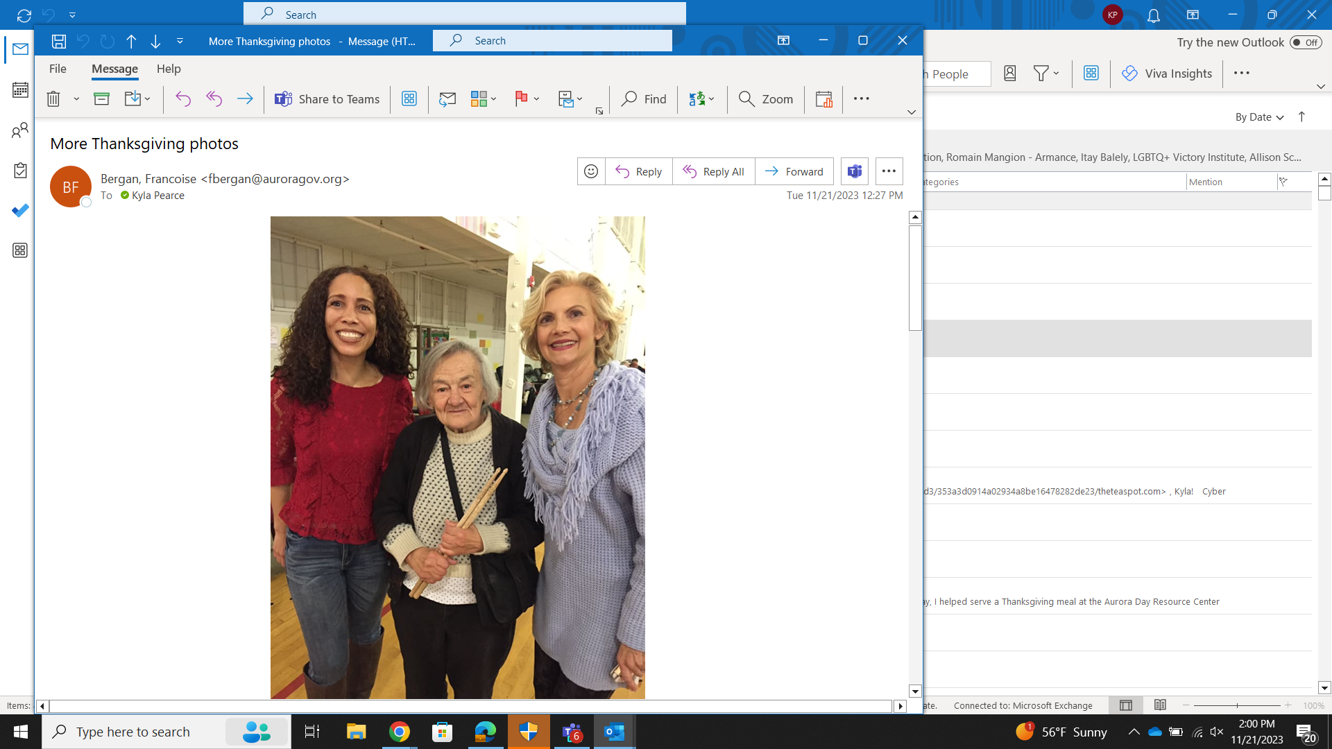 Aurora councilmembers Angela Lawson, left, and Francoise Bergan, right, pose together with a resident at the Day Resource Center, where they served Thanksgiving meals to homeless people. (Courtesy of Francoise Bergan)