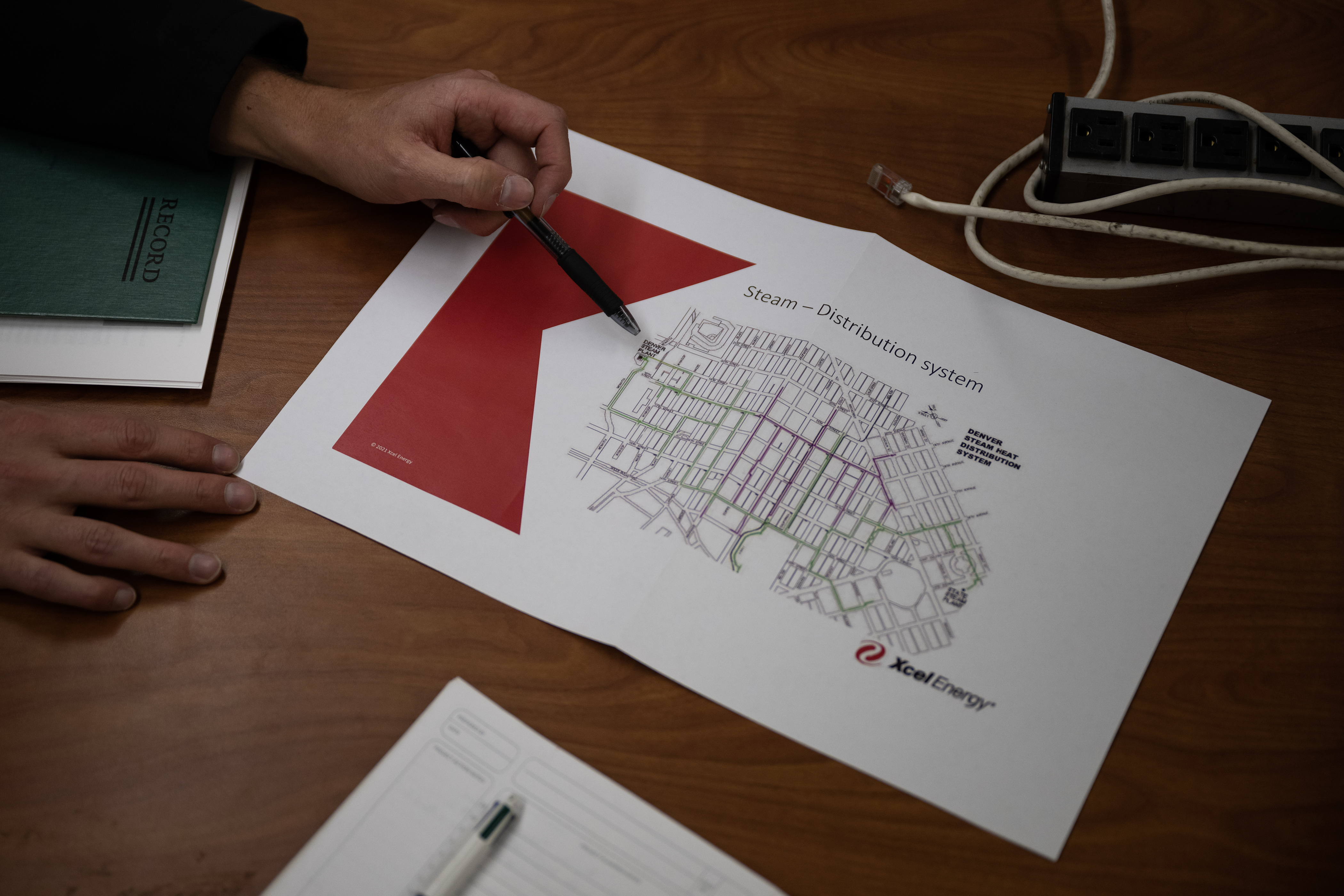Xcel Energy business development analyst Joe Schwark shows a map of the underground steam pipes running below the streets of Denver on Wednesday, Nov. 15, 2023, at the Xcel Energy Denver Steam Plant in Denver, Colo. (Timothy Hurst/Denver Gazette) (TimHursttim.hurst@gazette.comhttps://secure.gravatar.com/avatar/aca82bd62b4ee425c598527cd6faa1b1?d=mm&r=g)