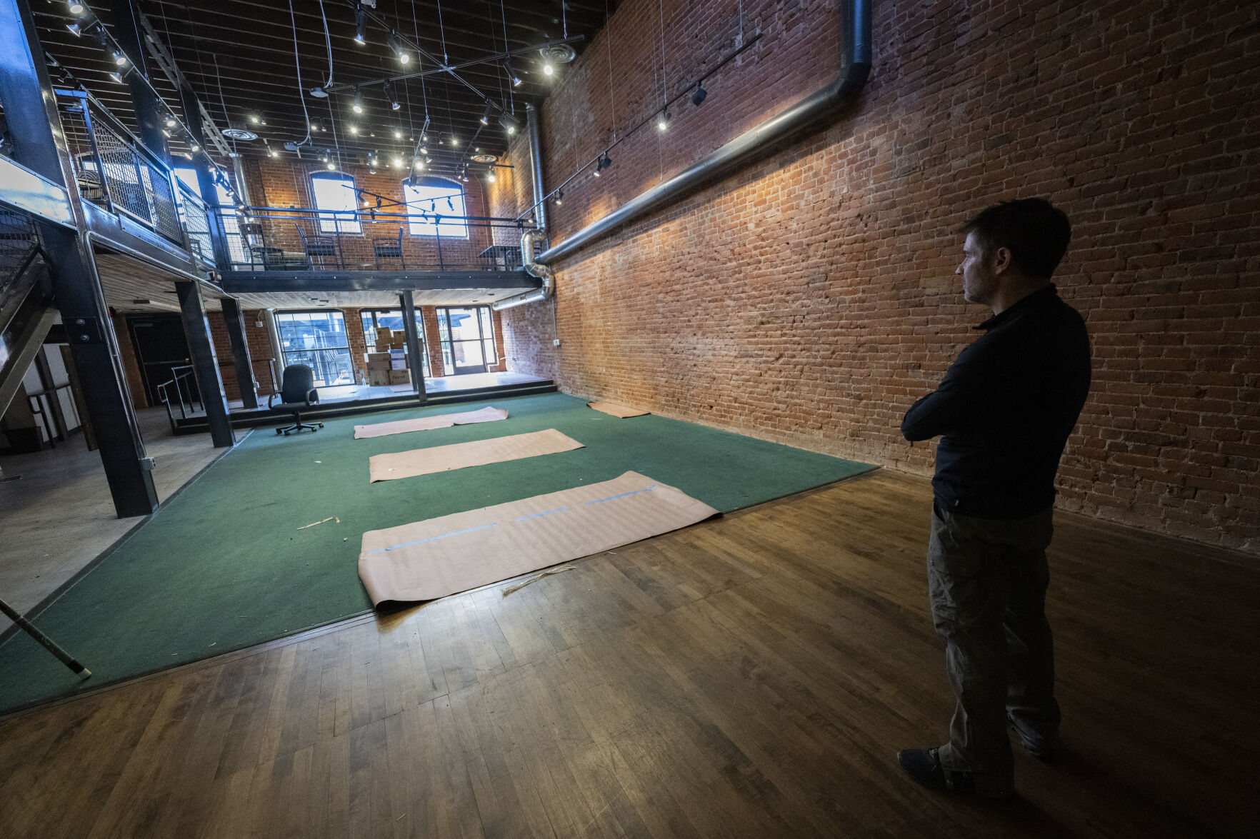 Joe Campana, local restauranteur and businessman, looks over the space of the former Tattered Cover bookstore at 112 N. Tejon St., which closed in October. Campana, who is a co-owner of several Springs restaurants and bars, along with partner Lucas Frye, plan to transform the space into The Crooked Cue, and upscale pool hall that also will feature darts and shuffleboard. The venue is targeted to open May 1. CHRISTIAN MURDOCK, THE GAZETTE