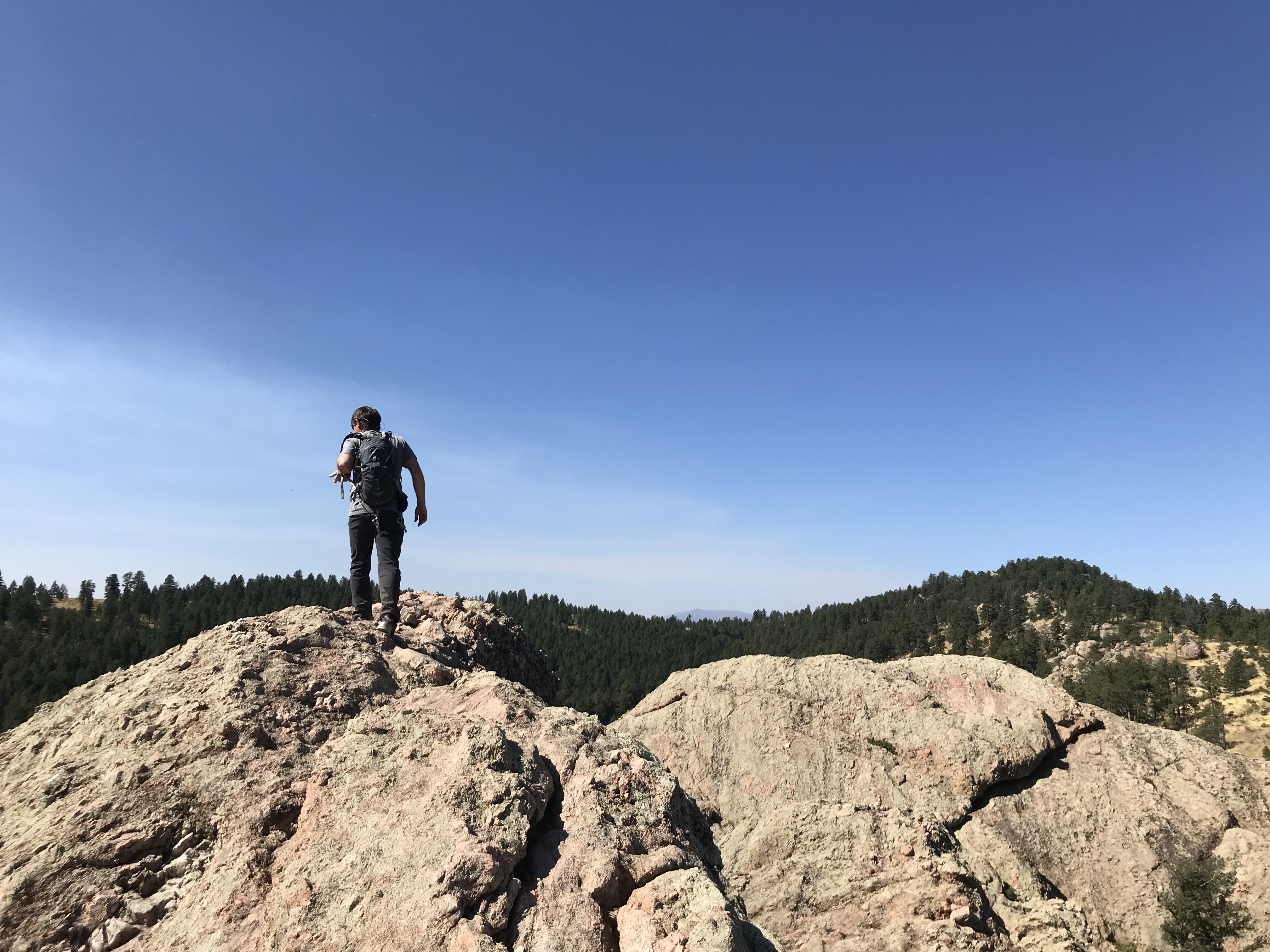Shannon Coleman steps to the top of Arthur’s Rock at Lory State Park near Fort Collins. (Seth Boster, The Gazette)