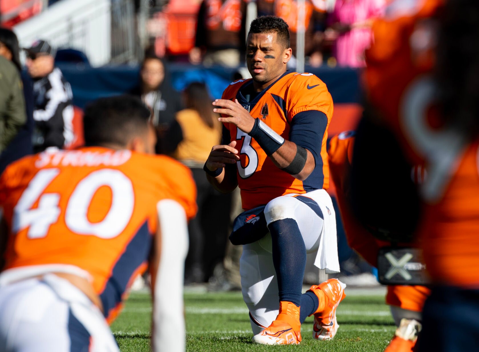 Denver Broncos quarterback Russell Wilson (3) warms up before a game on Sunday, Nov. 26, 2023, at Empower Field at Mile High in Denver, Colo. (Parker Seibold, The Gazette) (Parker Seibold)