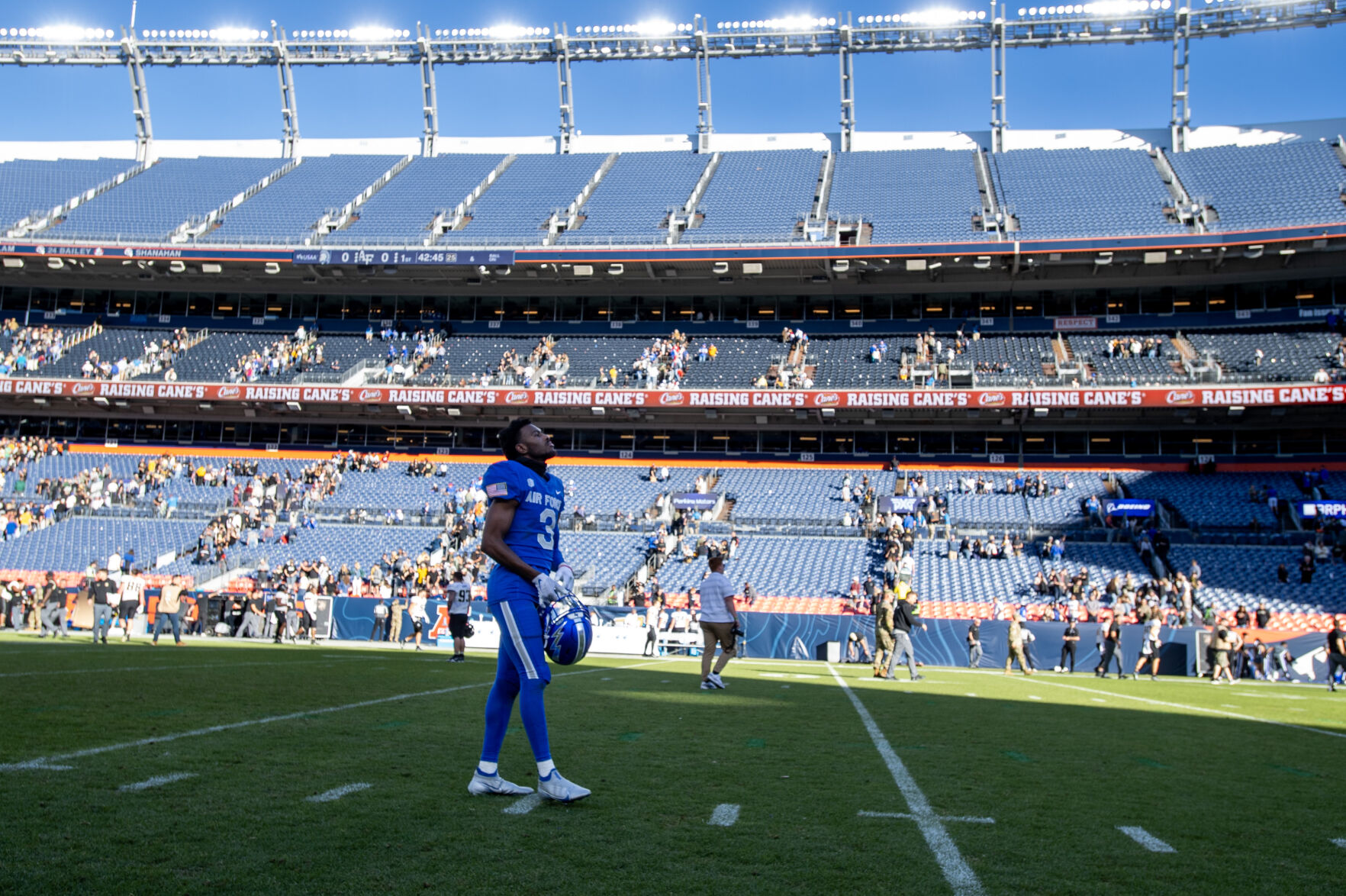 Air Force Falcons defensive back Jamari Bellamy (3) takes a moment as one of the last Air Force players on the field after a loss against Army Black Knights Saturday at Empower Field at Mile High in Denver. (Parker Seibold, the gazette)